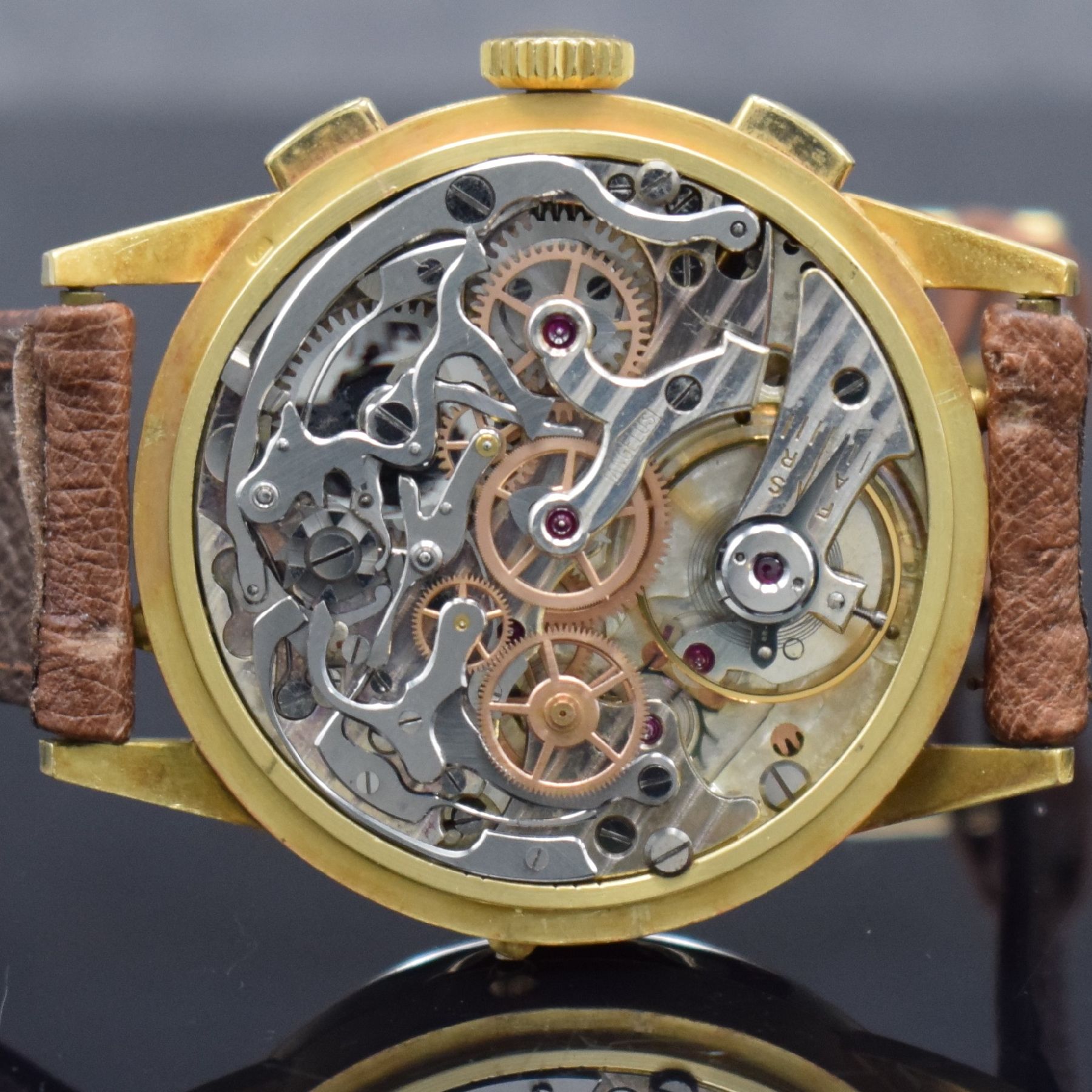 Detail m: ANGELUS Chronodato seltener Schaltradchronograph mit Vollkalender in GG 750/000, Schweiz um 1945, Handaufzug, 3-tlg. Geh., Boden & Glasrand aufgedr., ...