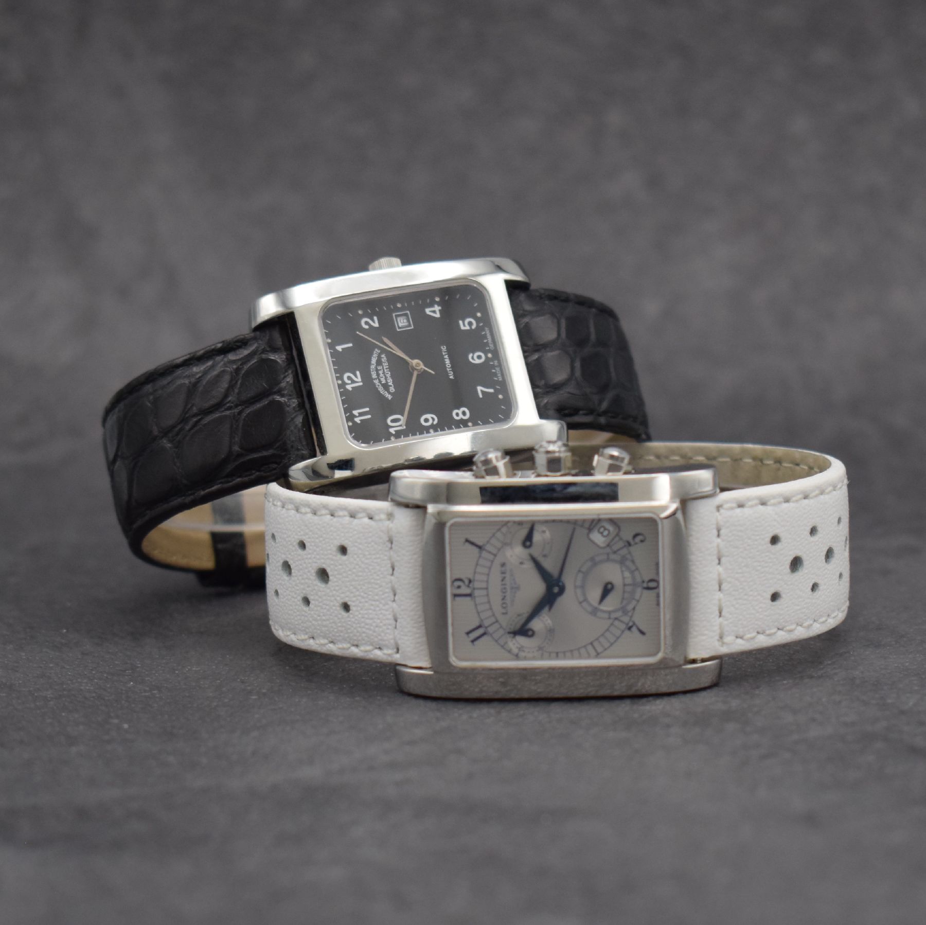 LONGINES / MÜHLE GLASHÜTTE 2 rechteckige Armbanduhren in Stahl, Schweiz/Deutschland um 2000, Automatik / Quartz, 4-fach verschr. Geh., 1. Mühle ...