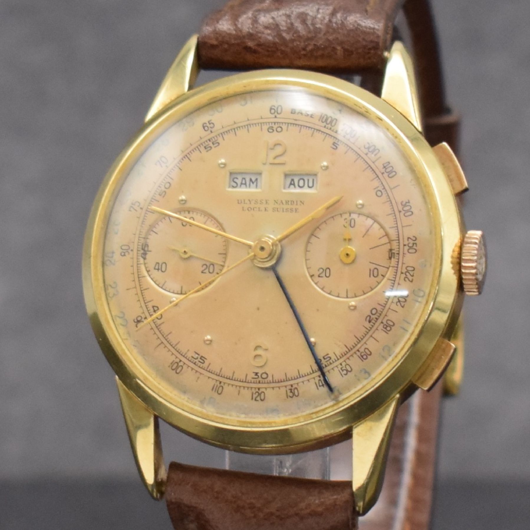 Detail c: ULYSSE NARDIN extrem seltener Schaltradchronograph mit Vollkalender Kaliber 23C in GG 750/000, Handaufzug, Schweiz um 1945, 3-teil. Geh., Boden & ...