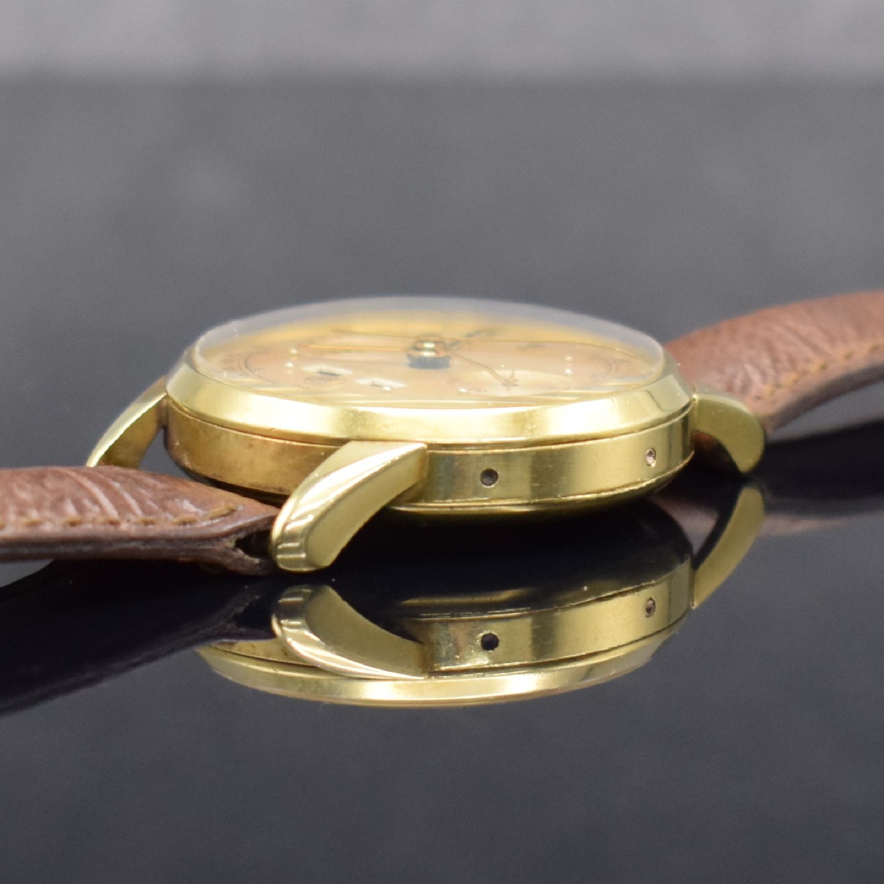 Detail d: ULYSSE NARDIN extrem seltener Schaltradchronograph mit Vollkalender Kaliber 23C in GG 750/000, Handaufzug, Schweiz um 1945, 3-teil. Geh., Boden & ...