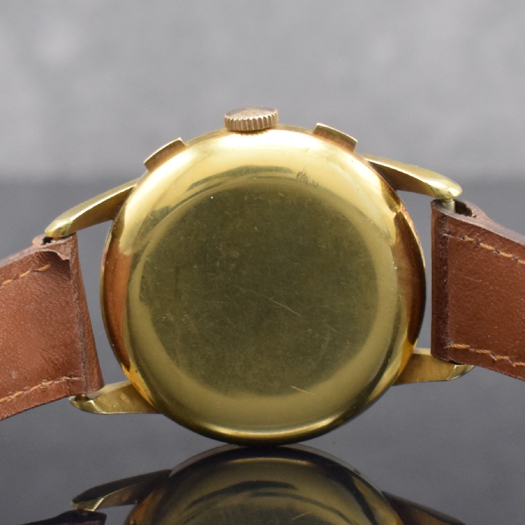 Detail e: ULYSSE NARDIN extrem seltener Schaltradchronograph mit Vollkalender Kaliber 23C in GG 750/000, Handaufzug, Schweiz um 1945, 3-teil. Geh., Boden & ...
