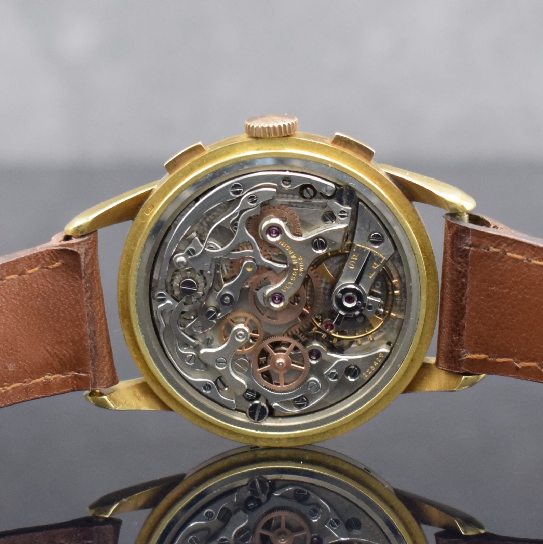 Detail f: ULYSSE NARDIN extrem seltener Schaltradchronograph mit Vollkalender Kaliber 23C in GG 750/000, Handaufzug, Schweiz um 1945, 3-teil. Geh., Boden & ...