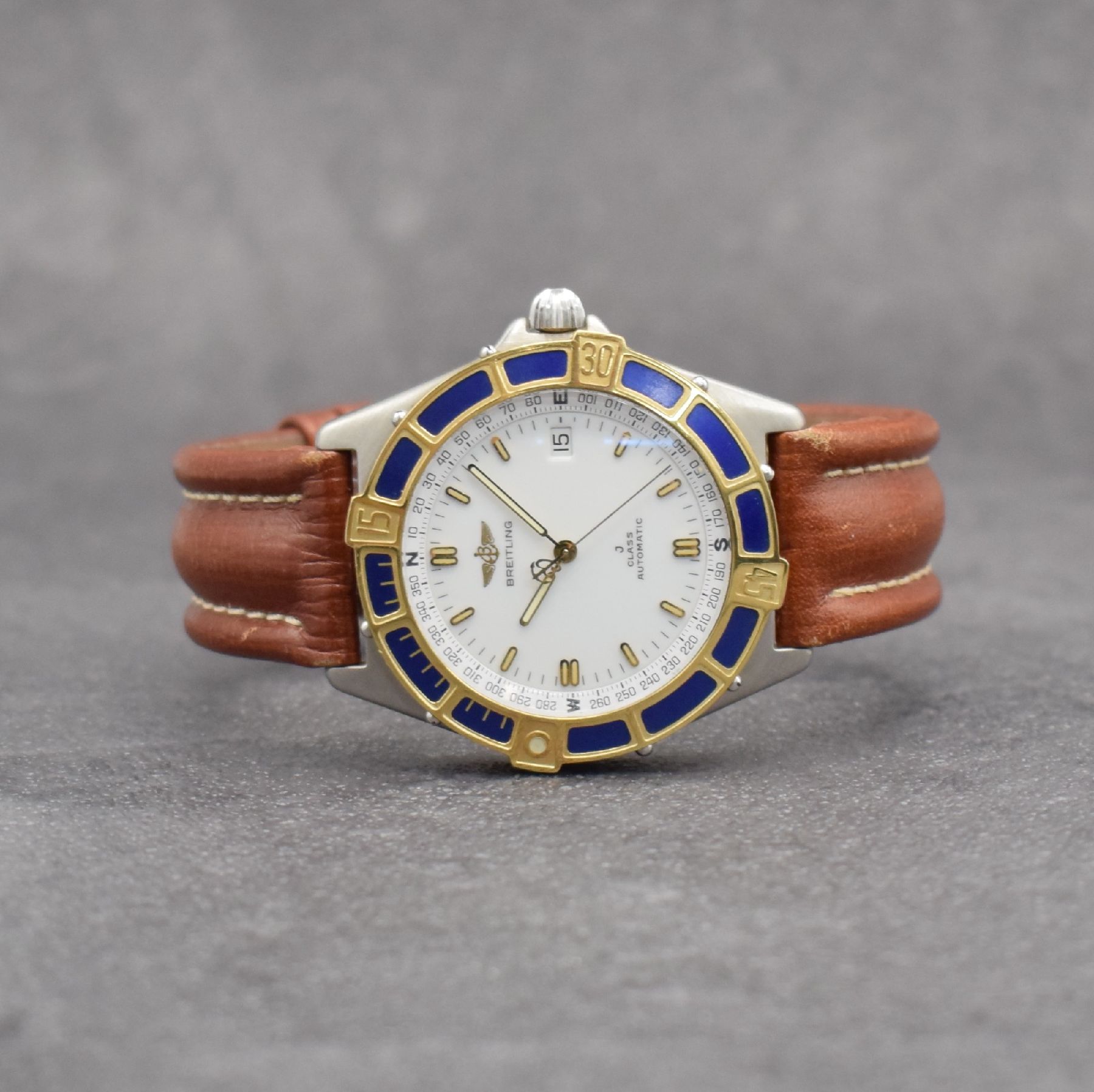 BREITLING J-Class Herrenarmbanduhr, Schweiz um 1995, Automatik, Ref. 80250, verschraubtes Edelstahlgeh., eins. drehb. Lünette in GG, orig. Lederband ...