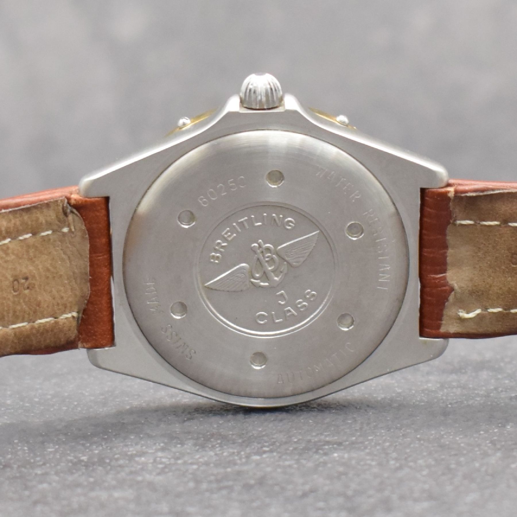 Detail g: BREITLING J-Class Herrenarmbanduhr, Schweiz um 1995, Automatik, Ref. 80250, verschraubtes Edelstahlgeh., eins. drehb. Lünette in GG, orig. Lederband ...