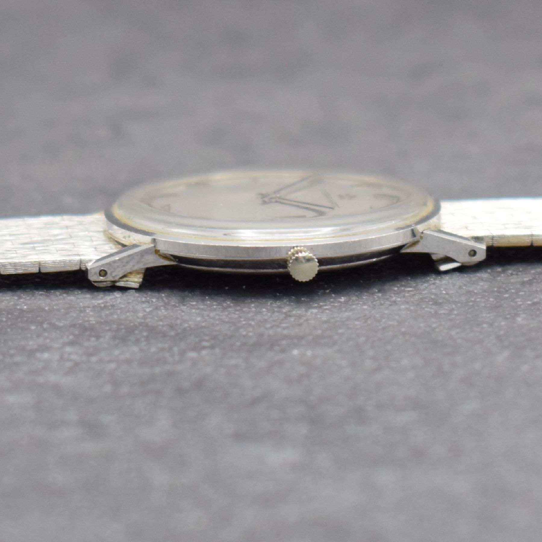 Detail f: ETERNA-MATIC Herrenarmbanduhr in WG 750/000, Schweiz um 1965, Automatik, Boden aufgedr., inkl. Band in WG 750/000, silb. Zifferbl. m. aufges. ...