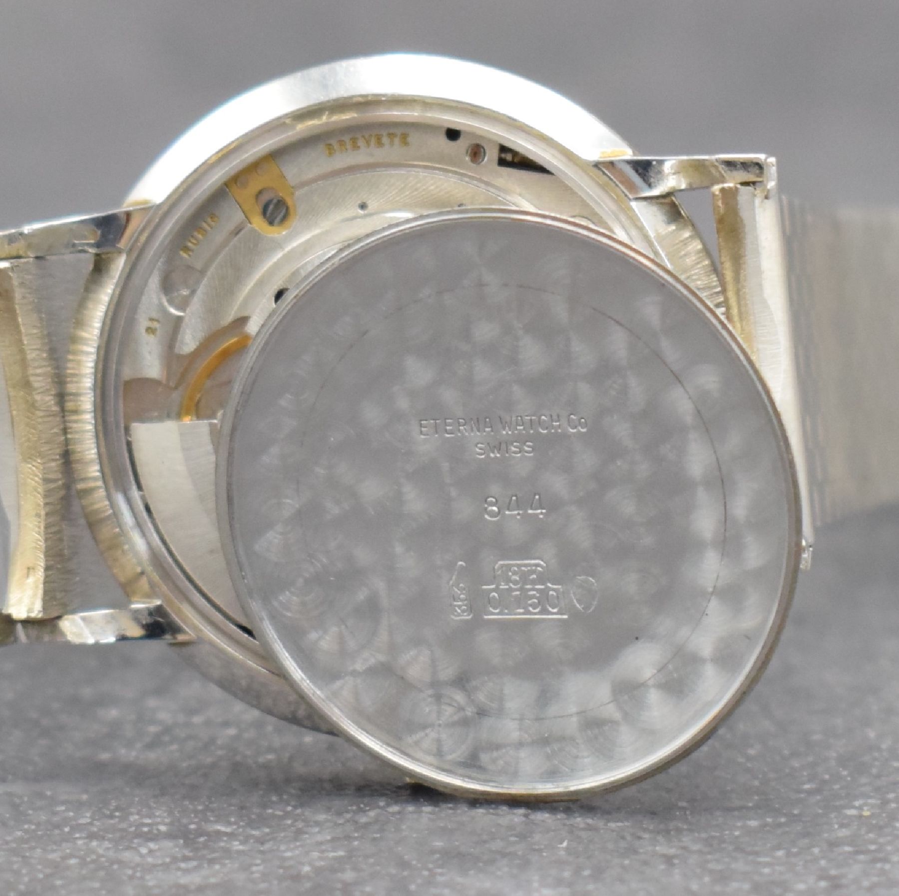 Detail k: ETERNA-MATIC Herrenarmbanduhr in WG 750/000, Schweiz um 1965, Automatik, Boden aufgedr., inkl. Band in WG 750/000, silb. Zifferbl. m. aufges. ...