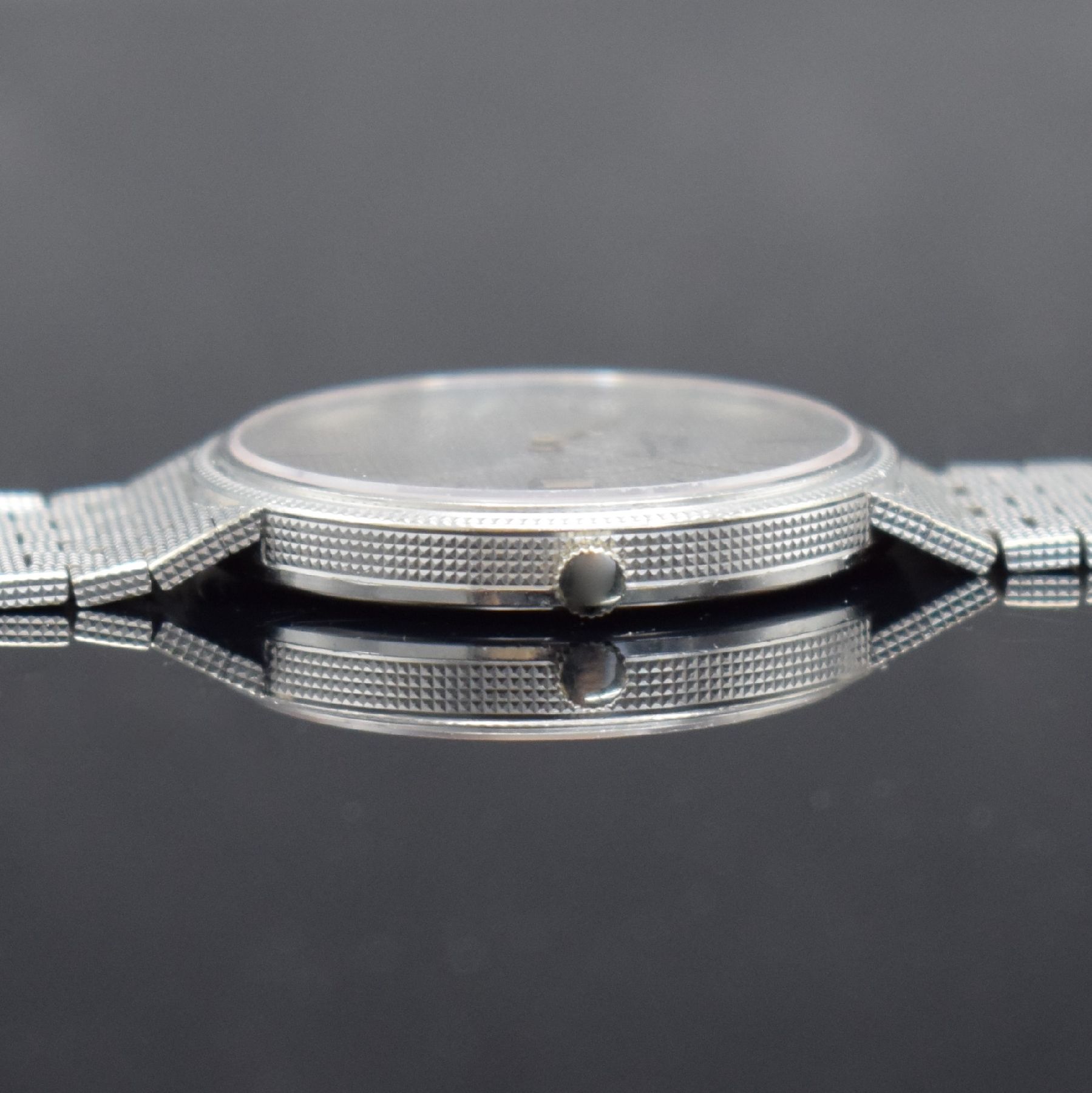 Detail f: PIAGET Armbanduhr in WG 750/000, Schweiz um 1980, Automatik, Ref. 13601 C4, massives Geh.,Boden aufgedr., silb. Zifferbl. fl., gold. Zeiger, Datum, ...
