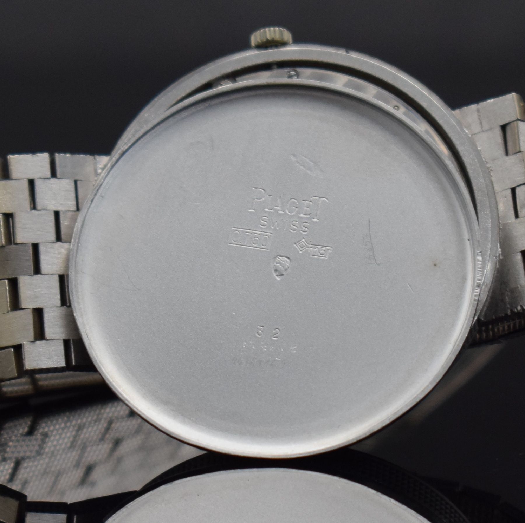 Detail m: PIAGET Armbanduhr in WG 750/000, Schweiz um 1980, Automatik, Ref. 13601 C4, massives Geh.,Boden aufgedr., silb. Zifferbl. fl., gold. Zeiger, Datum, ...