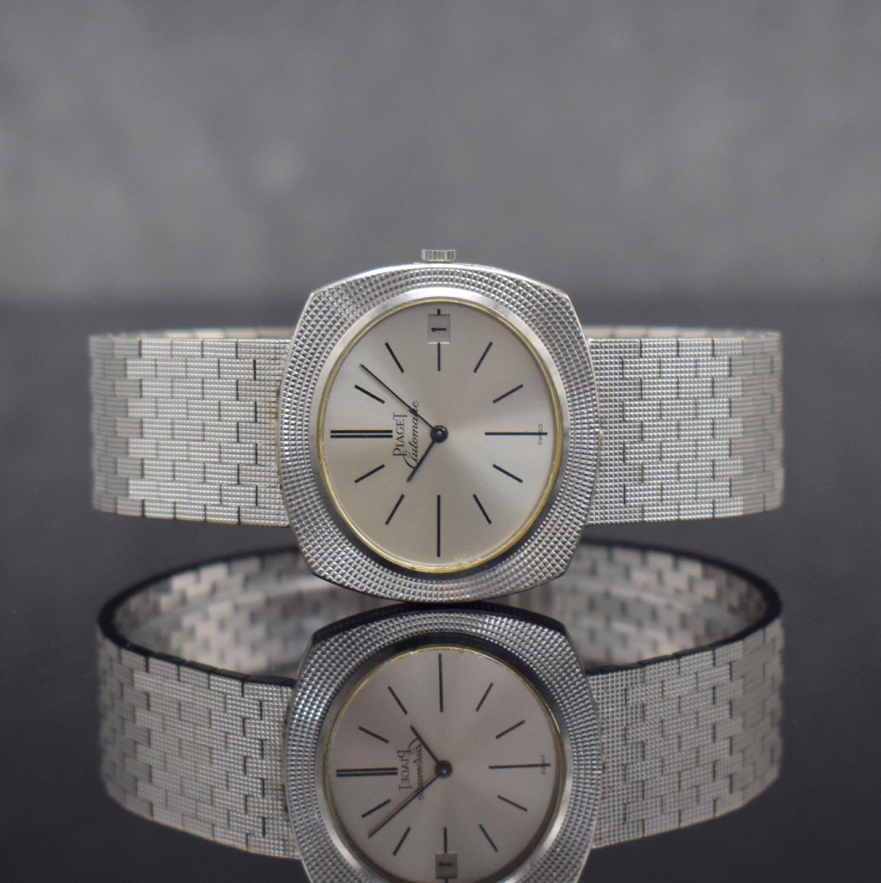 PIAGET Armbanduhr in WG 750/000 Ref. 13448, Schweiz um 1970, Automatik, massives Geh., Boden 4-fach verschr., WG 750/000 Gliederband, silb. ...