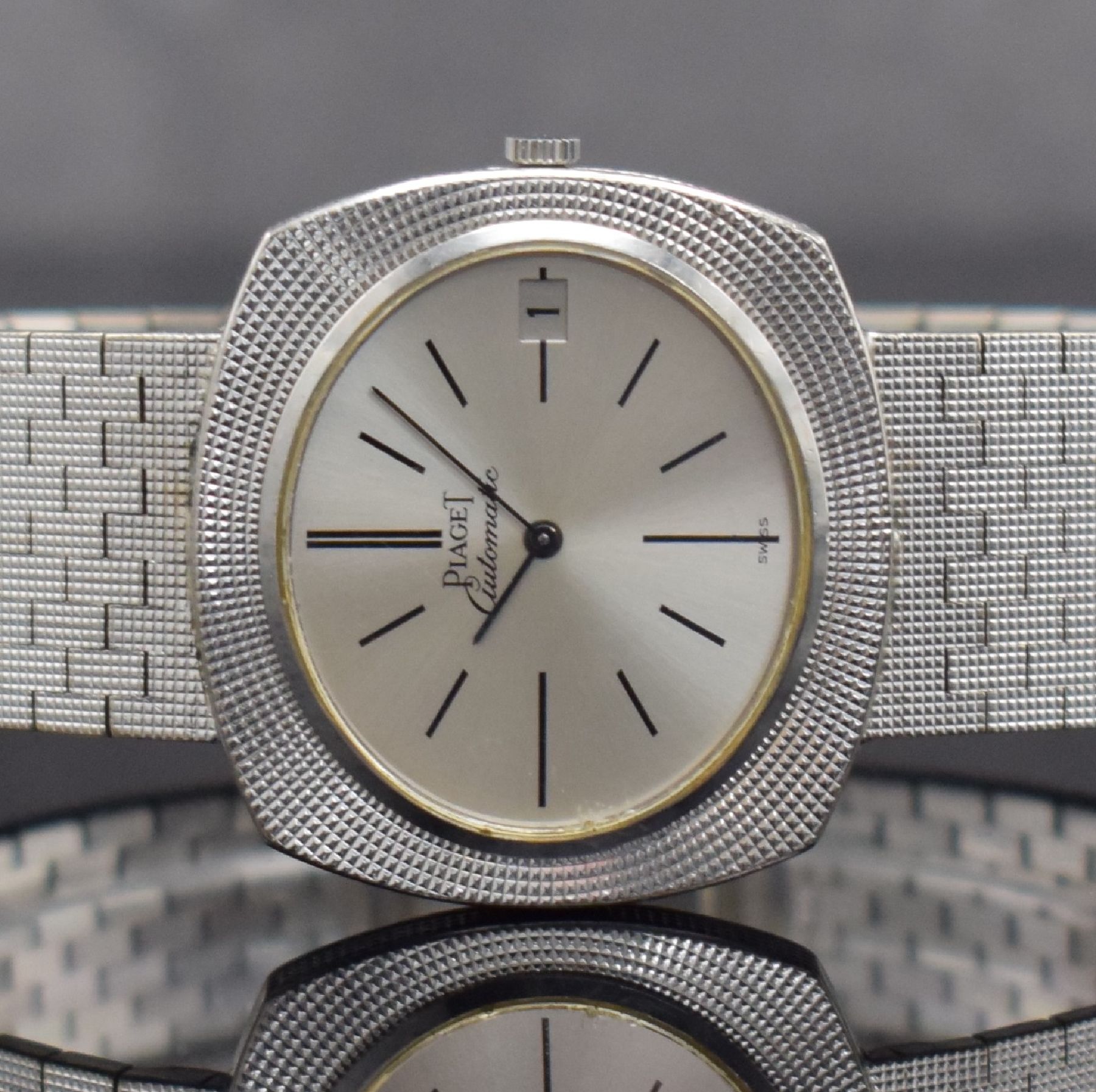 Detail a: PIAGET Armbanduhr in WG 750/000 Ref. 13448, Schweiz um 1970, Automatik, massives Geh., Boden 4-fach verschr., WG 750/000 Gliederband, silb. ...