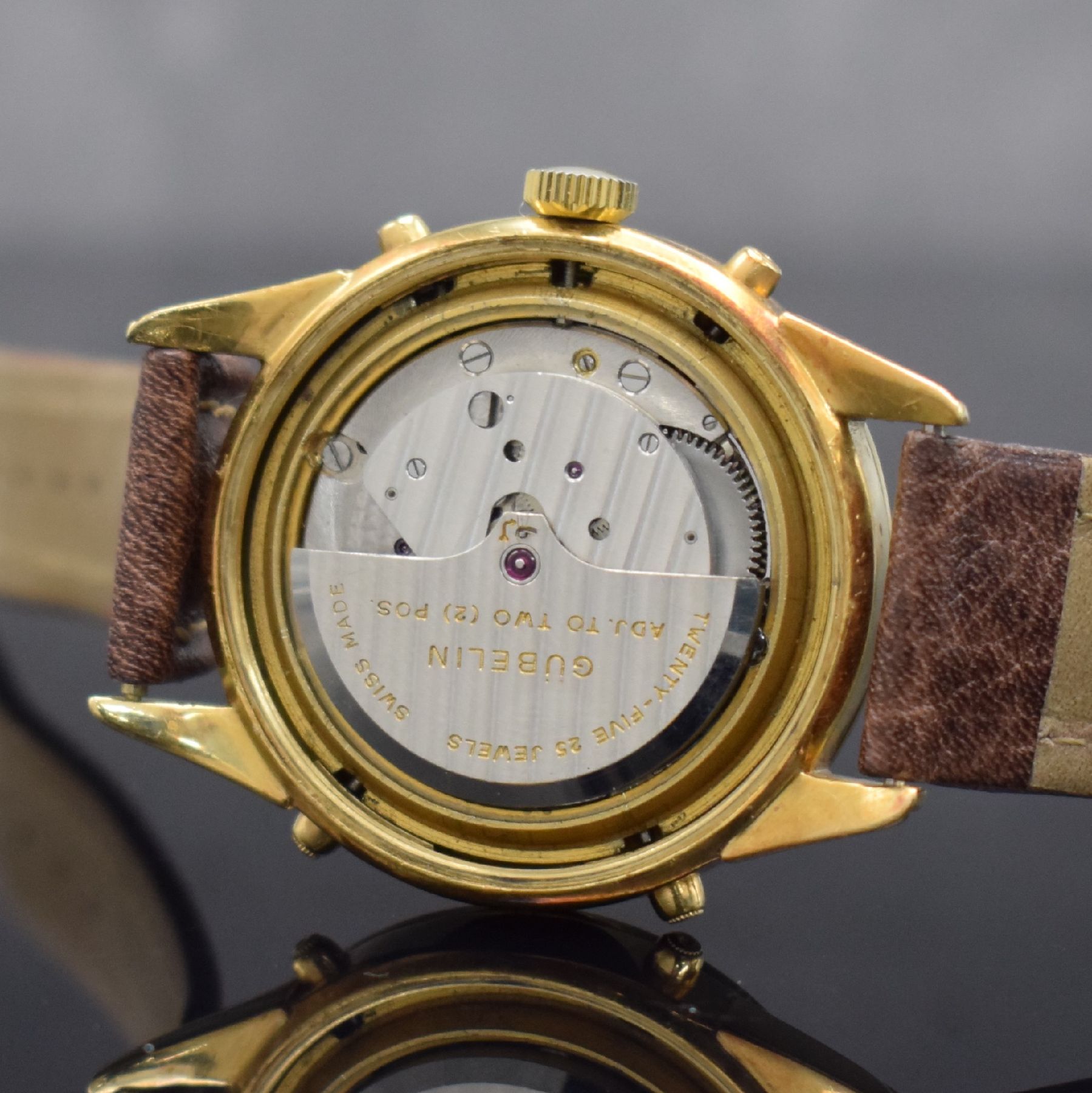 Detail g: GÜBELIN Herrenarmbanduhr Ipso Matic mit in GG 750/000 mit Vollkalender, Automatik, Schweiz um 1950, 3-teil. Geh., Boden verschr., Lünette aufgedr., ...