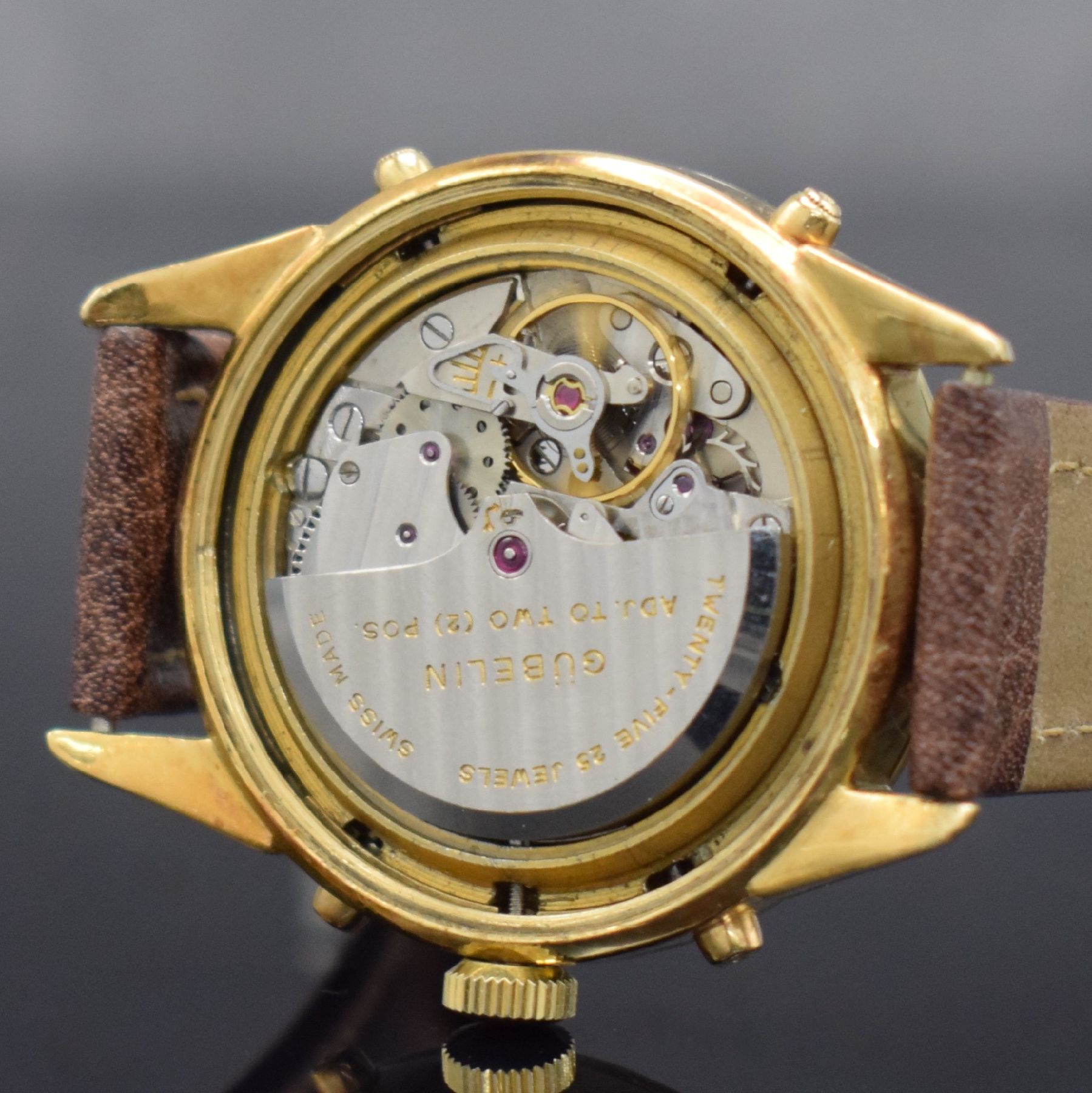 Detail h: GÜBELIN Herrenarmbanduhr Ipso Matic mit in GG 750/000 mit Vollkalender, Automatik, Schweiz um 1950, 3-teil. Geh., Boden verschr., Lünette aufgedr., ...