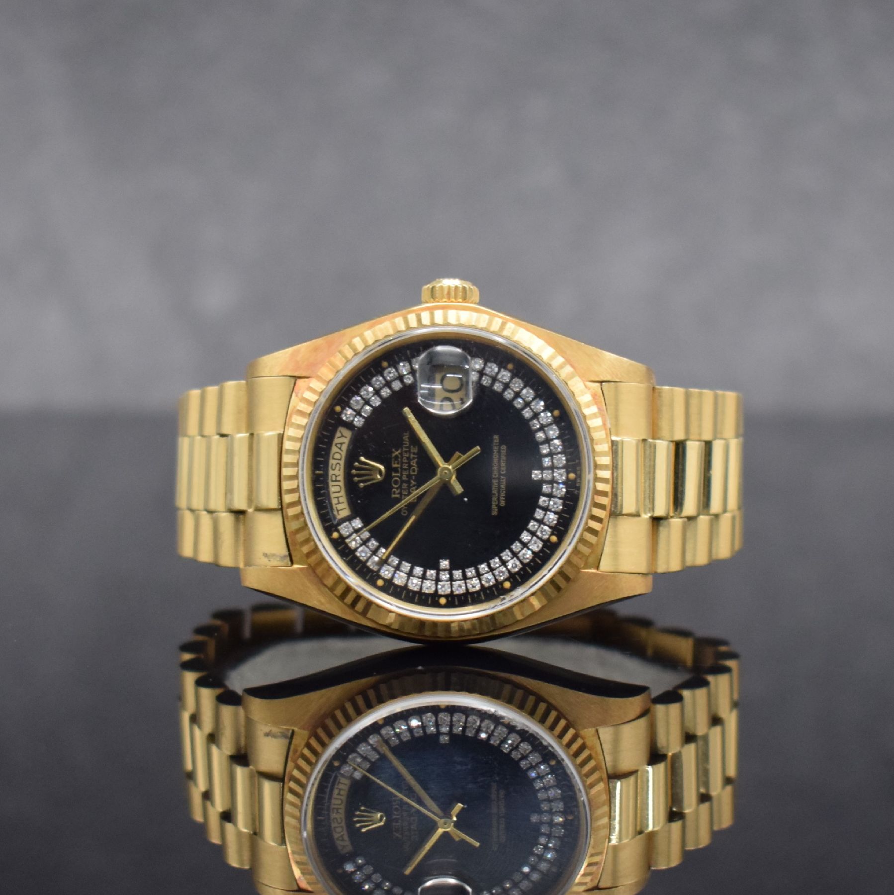 ROLEX Herrenarmbanduhr Oyster Perpetual Day- Date in GG 750/000 Referenz 18038, Schweiz um 1982, Automatik, Chronometer der Superlative, ...
