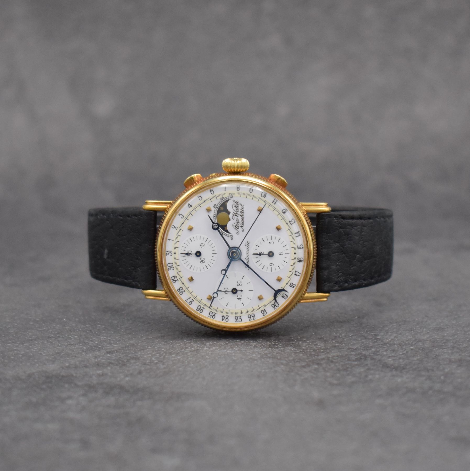 AERO WATCH Neuchatel Herrenarmbanduhr mit Chronograph, Mondphase & Datum in GG 750/000, Schweiz um 1990, Handaufzug, 3-teil. Geh., Boden & Glasrand ...