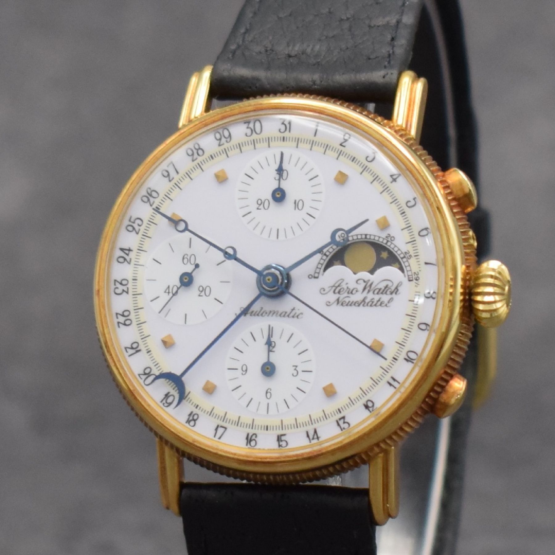 Detail c: AERO WATCH Neuchatel Herrenarmbanduhr mit Chronograph, Mondphase & Datum in GG 750/000, Schweiz um 1990, Handaufzug, 3-teil. Geh., Boden & Glasrand ...