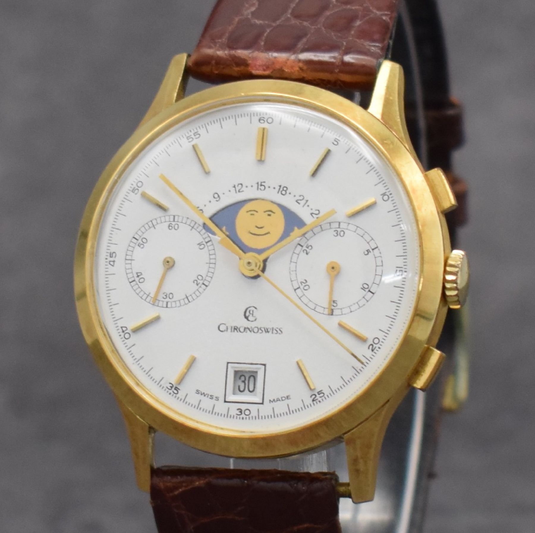 Detail c: CHRONOSWISS Herrenarmbanduhr mit Chronograph, Mondphase & Datum in GG 750/000, Schweiz um 1980, Handaufzug, 3-teil. Geh., Boden & Glasrand aufgedr., ...