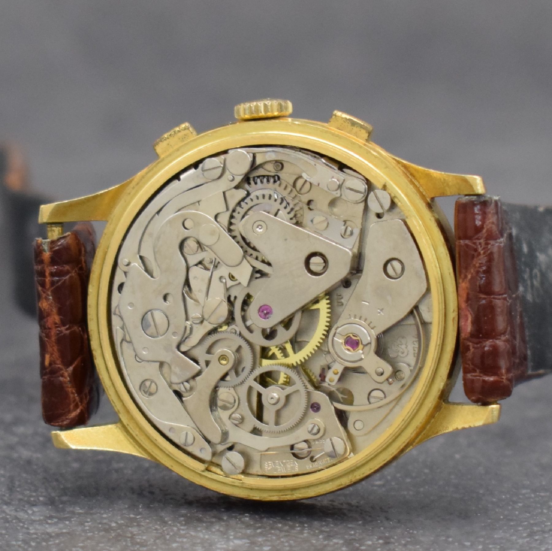Detail f: CHRONOSWISS Herrenarmbanduhr mit Chronograph, Mondphase & Datum in GG 750/000, Schweiz um 1980, Handaufzug, 3-teil. Geh., Boden & Glasrand aufgedr., ...