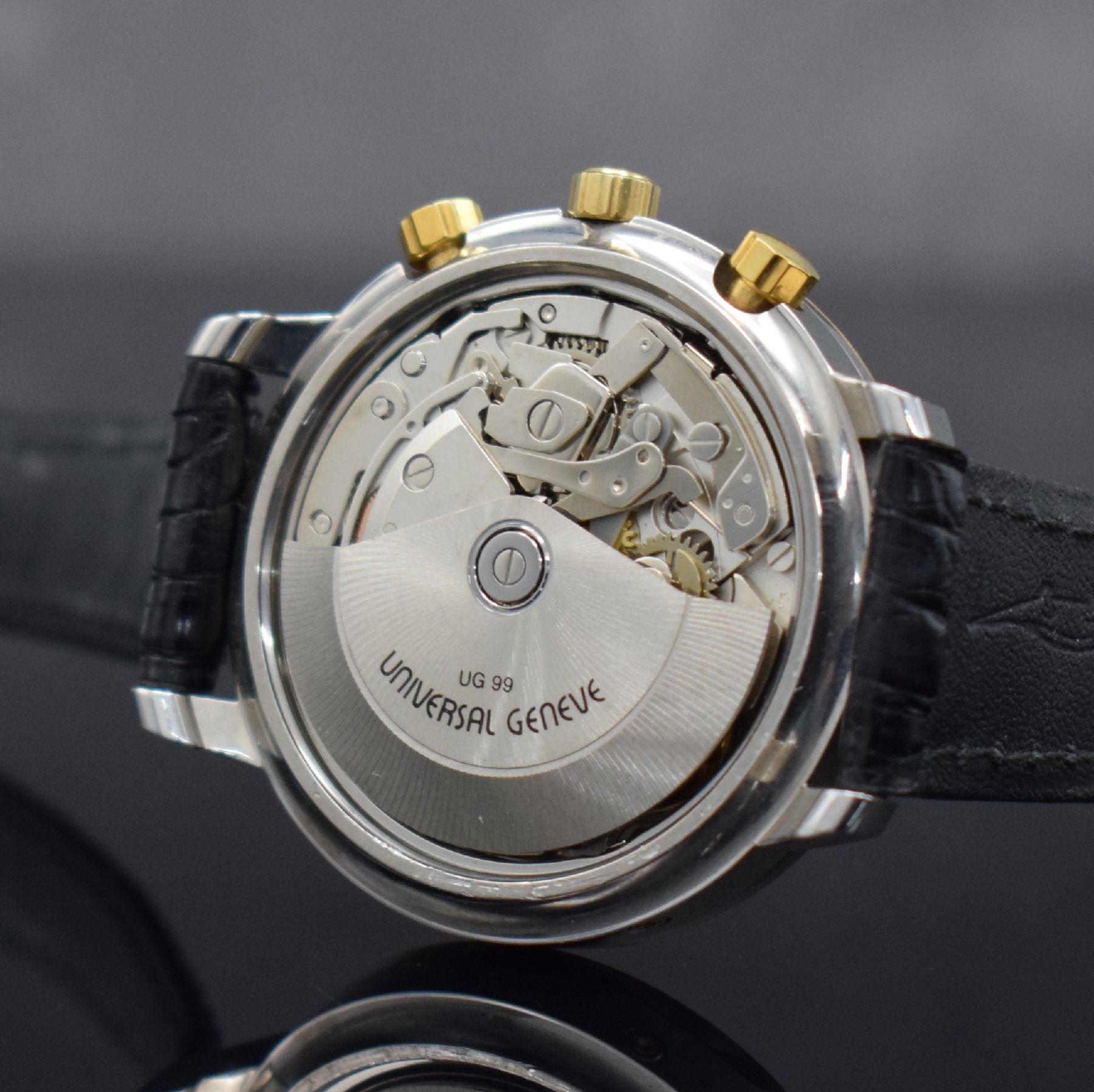 Detail f: UNIVERSAL GENEVE Herrenarmbanduhr mit Chronograph & Vollkalender, Schweiz um 1990, Automatik, Edelstahlgeh., GG 750/000 Lünette m. Clous de Paris ...