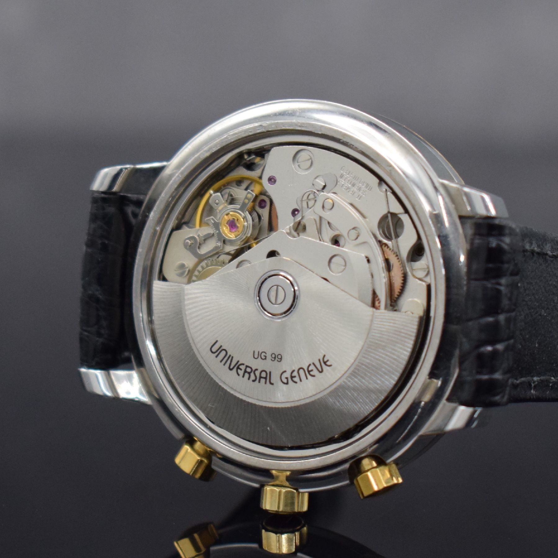 Detail g: UNIVERSAL GENEVE Herrenarmbanduhr mit Chronograph & Vollkalender, Schweiz um 1990, Automatik, Edelstahlgeh., GG 750/000 Lünette m. Clous de Paris ...