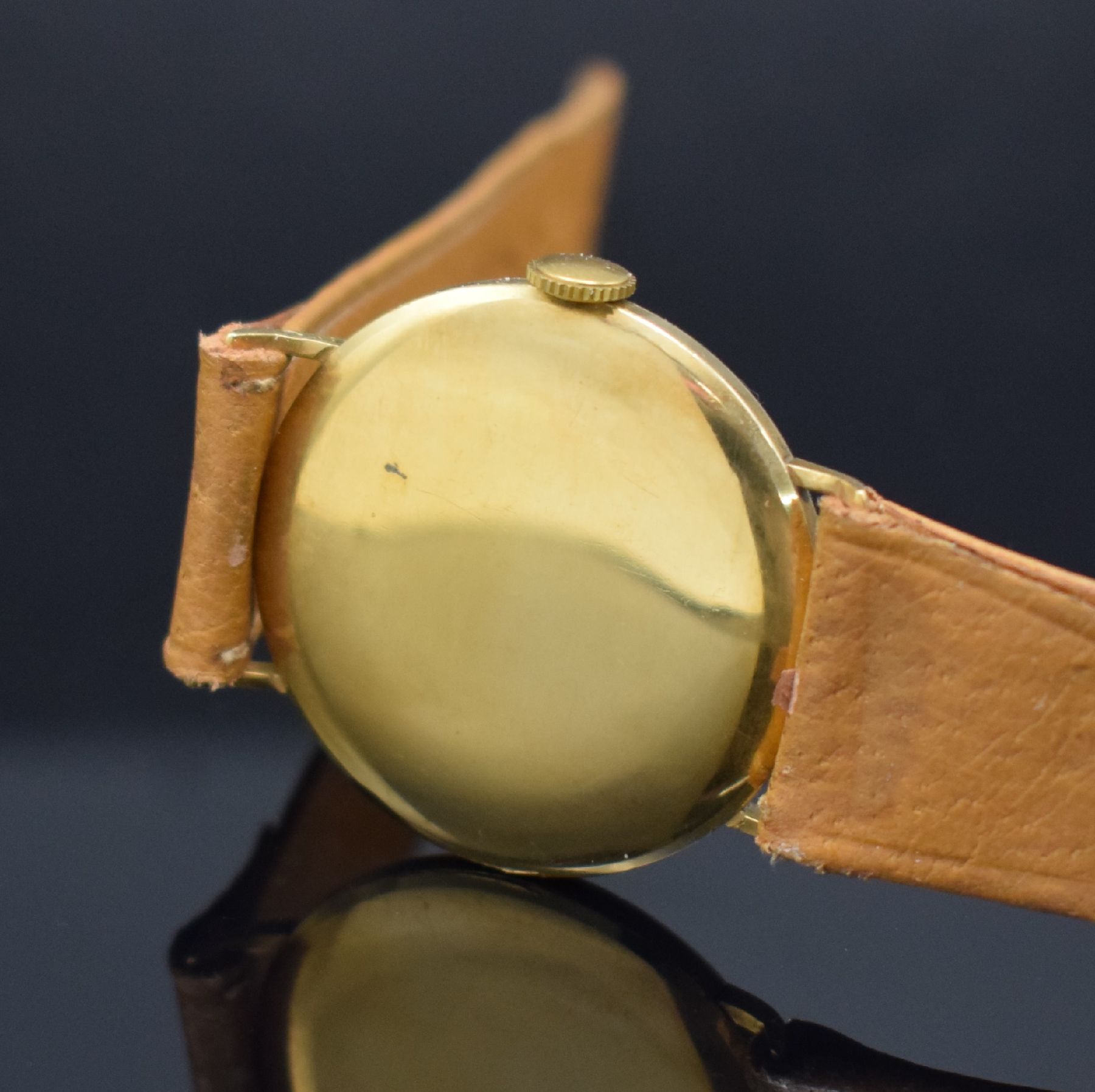 Detail d: ZENITH Herrenarmbanduhr in GG 750/000, Schweiz um 1940, Handaufzug, 3-teil. Gehäuse, Boden & Glasrand aufgedr., gold. Zifferbl. m. arab. Zahlen, ...