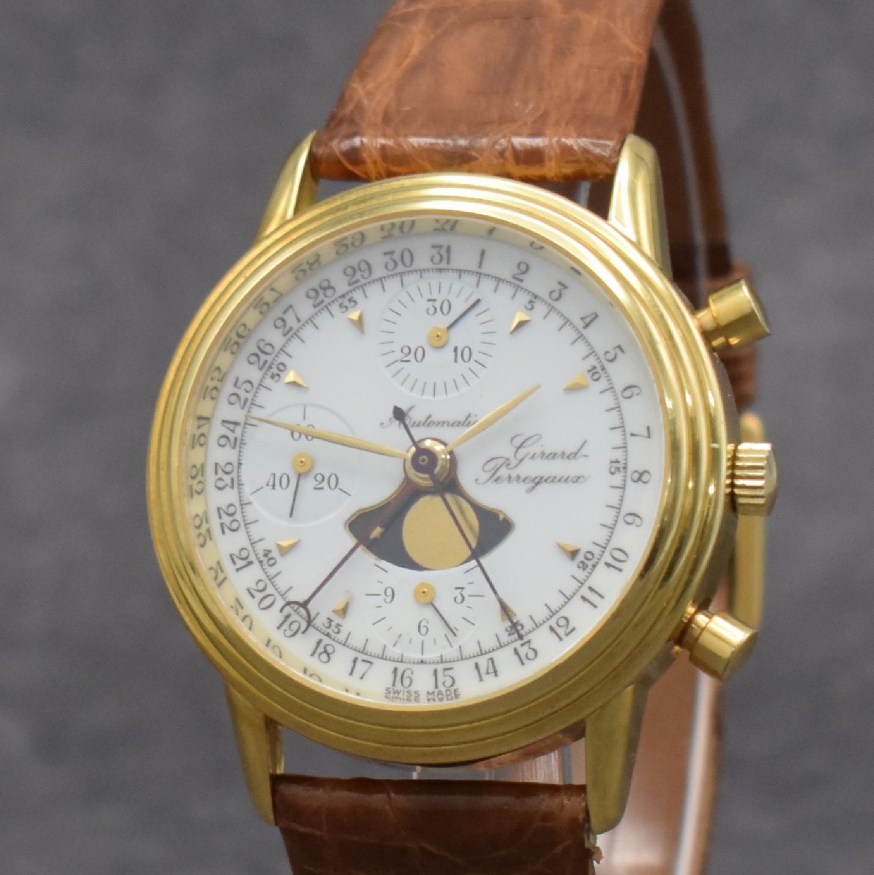 Detail c: GIRARD PERREGAUX Herrenarmbanduhr in GG 750/000 mit Chronograph, Mondphase & Datum, Schweiz um 1990, Automatik, beids. vergl. Gehäuse, Boden gedr., ...