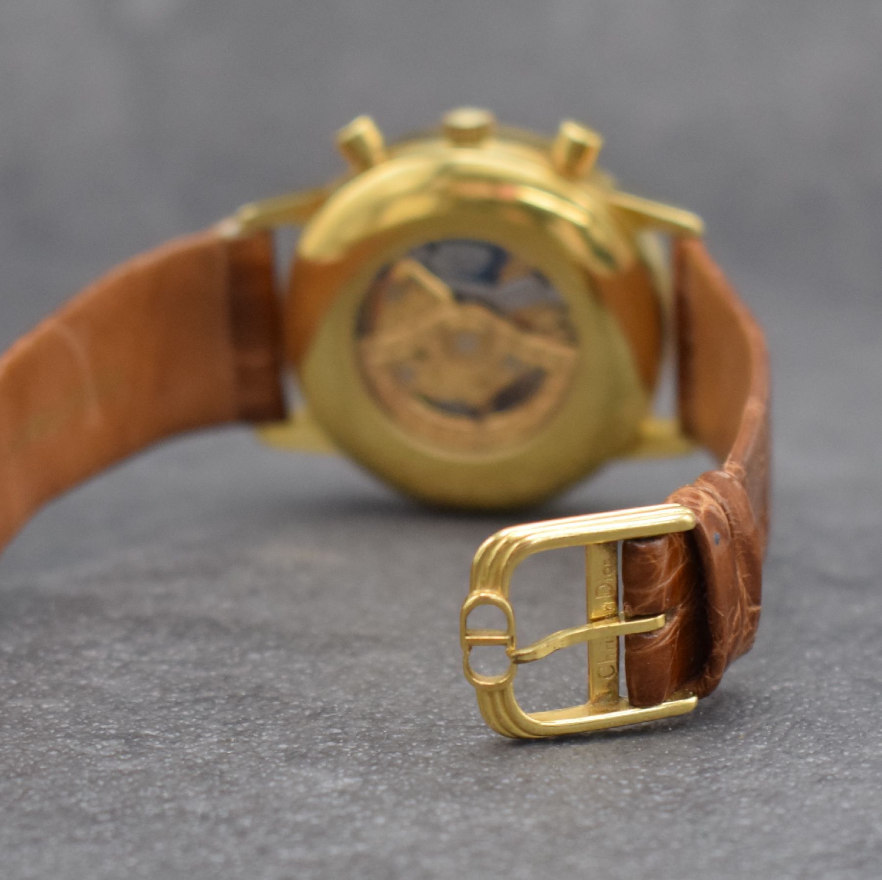 Detail d: GIRARD PERREGAUX Herrenarmbanduhr in GG 750/000 mit Chronograph, Mondphase & Datum, Schweiz um 1990, Automatik, beids. vergl. Gehäuse, Boden gedr., ...