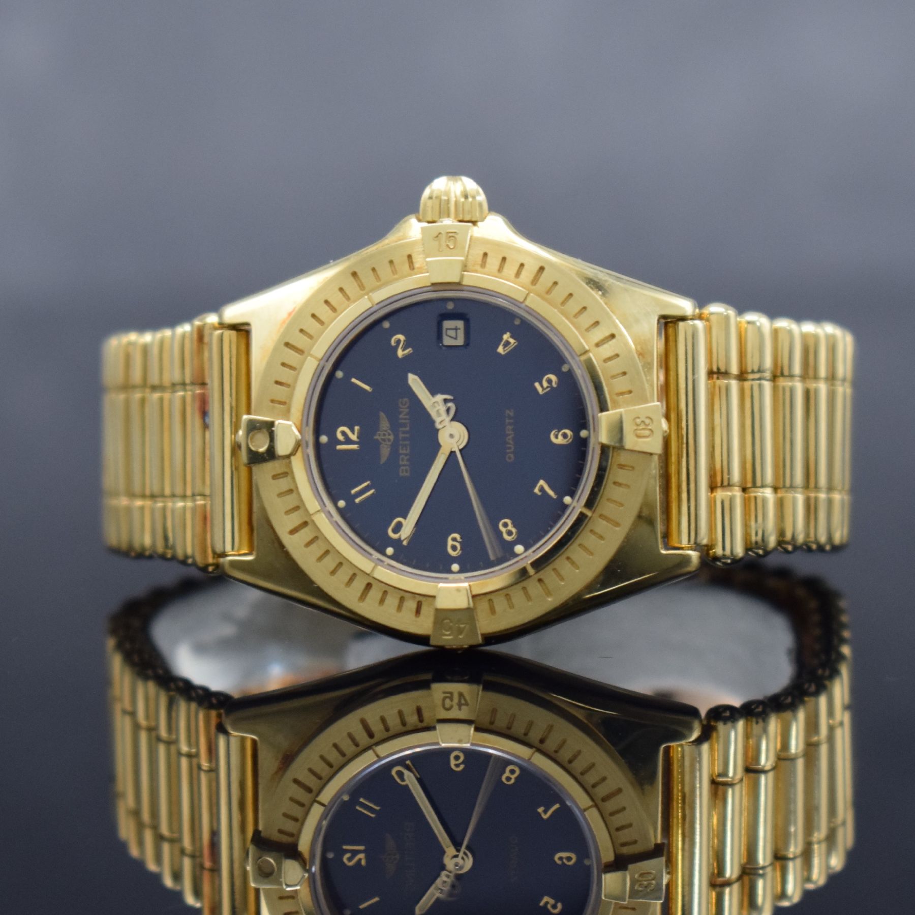 BREITLING Damenarmbanduhr in GG 750/000, Schweiz um 1990, quarz, Ref. 80560, massives Goldgeh., Boden geschr., eins. drehb. Lünette, GG 750/000 ...