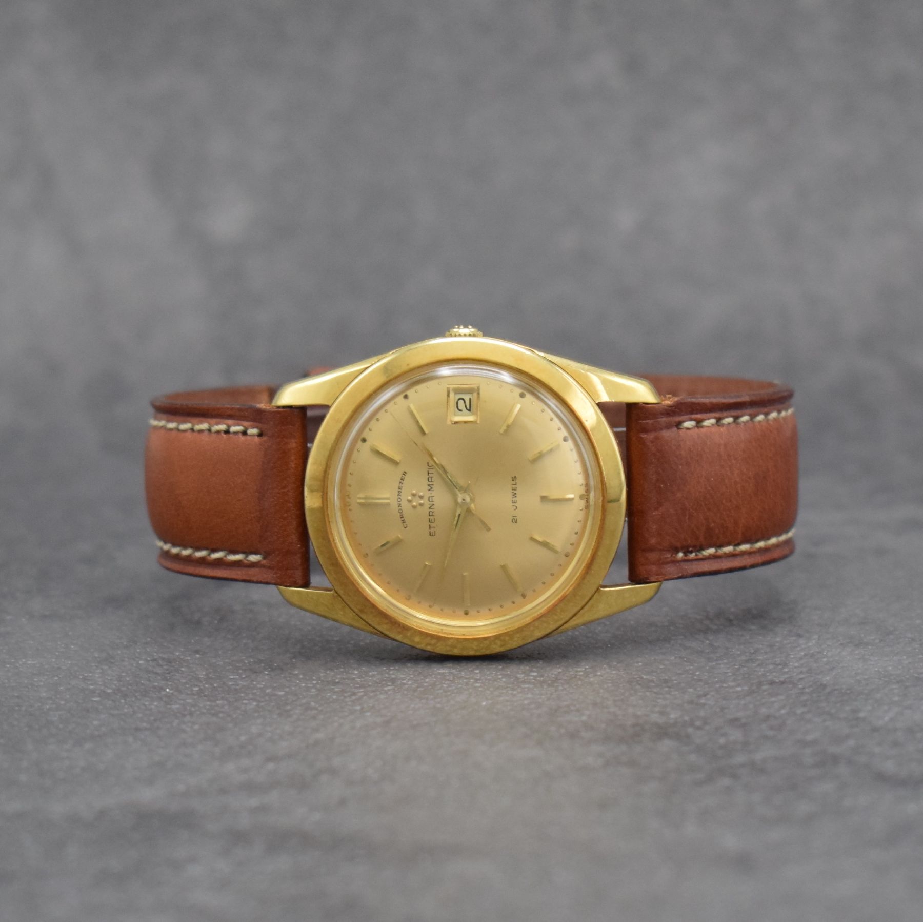 ETERNA Chronometer Herrenarmbanduhr in GG 750/000, Schweiz um 1960, Automatik, Boden m. Wappen geschr., gold. Zifferbl. m. aufgel. Std.-Ind., gold. ...