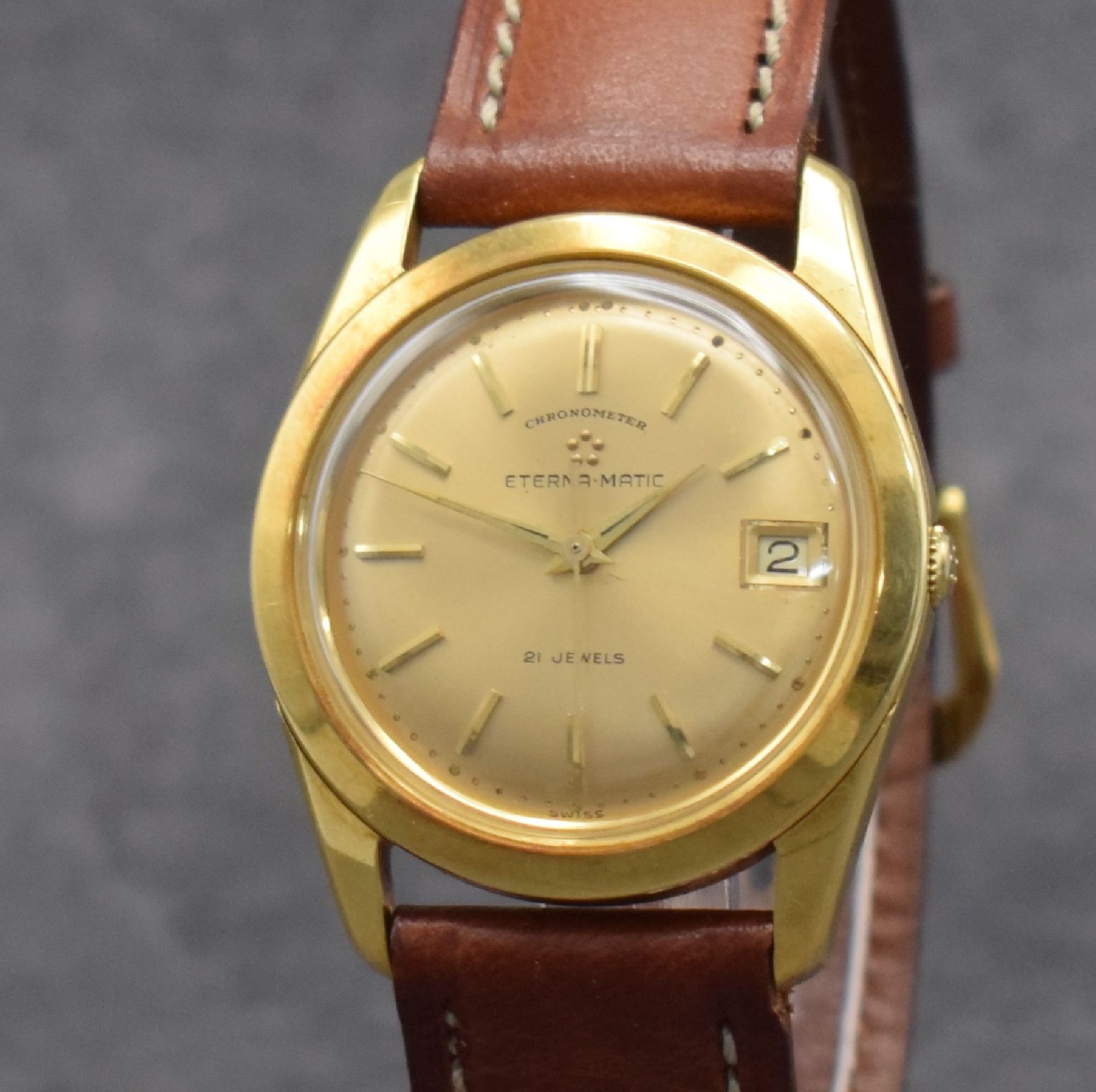 Detail c: ETERNA Chronometer Herrenarmbanduhr in GG 750/000, Schweiz um 1960, Automatik, Boden m. Wappen geschr., gold. Zifferbl. m. aufgel. Std.-Ind., gold. ...