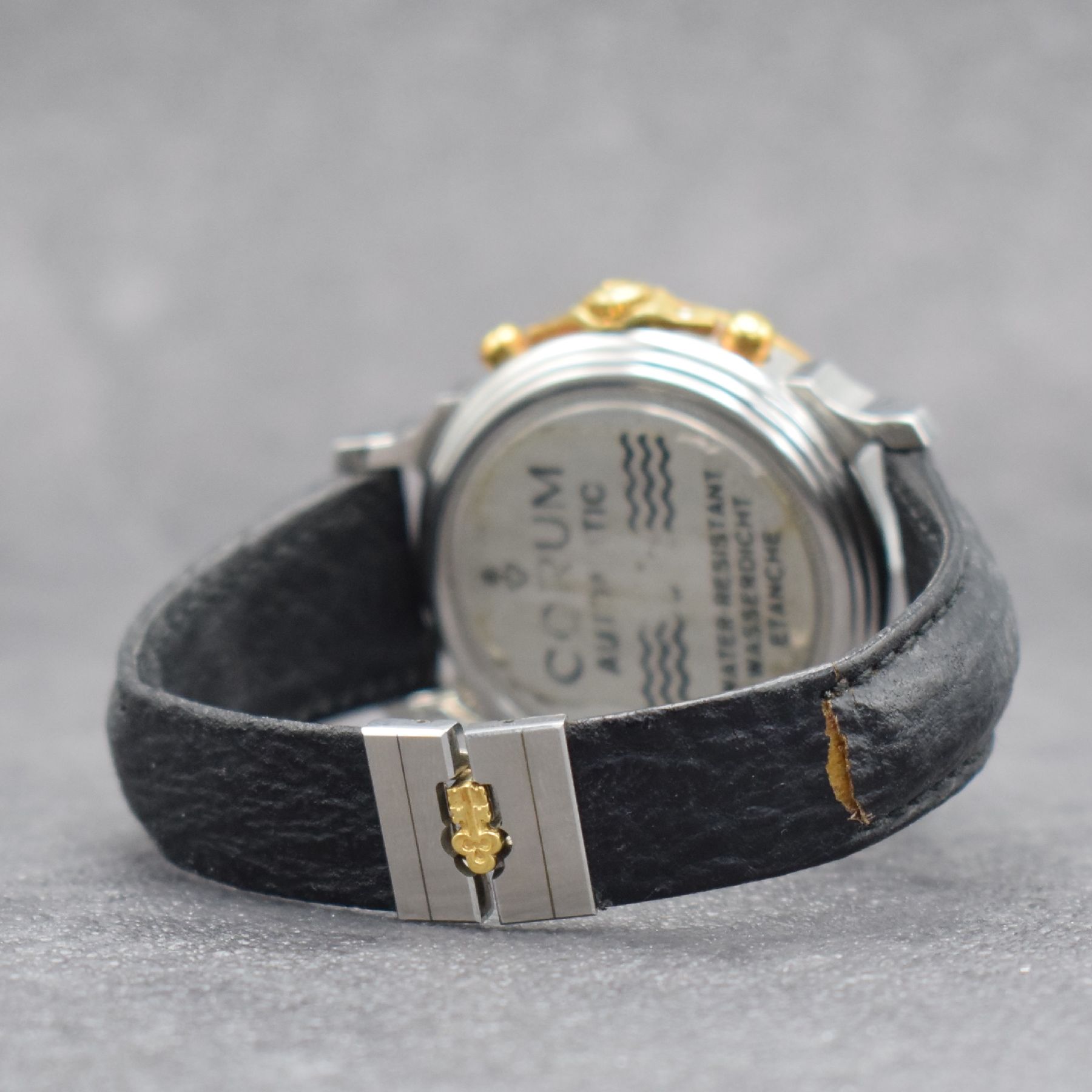 Detail d: CORUM Armbandchronograph Les Temps Mecanique Referenz 77.111.21, Automatik, Schweiz um 1990, Edelstahl/Gold kombiniert inkl. orig. Lederband (zu ...