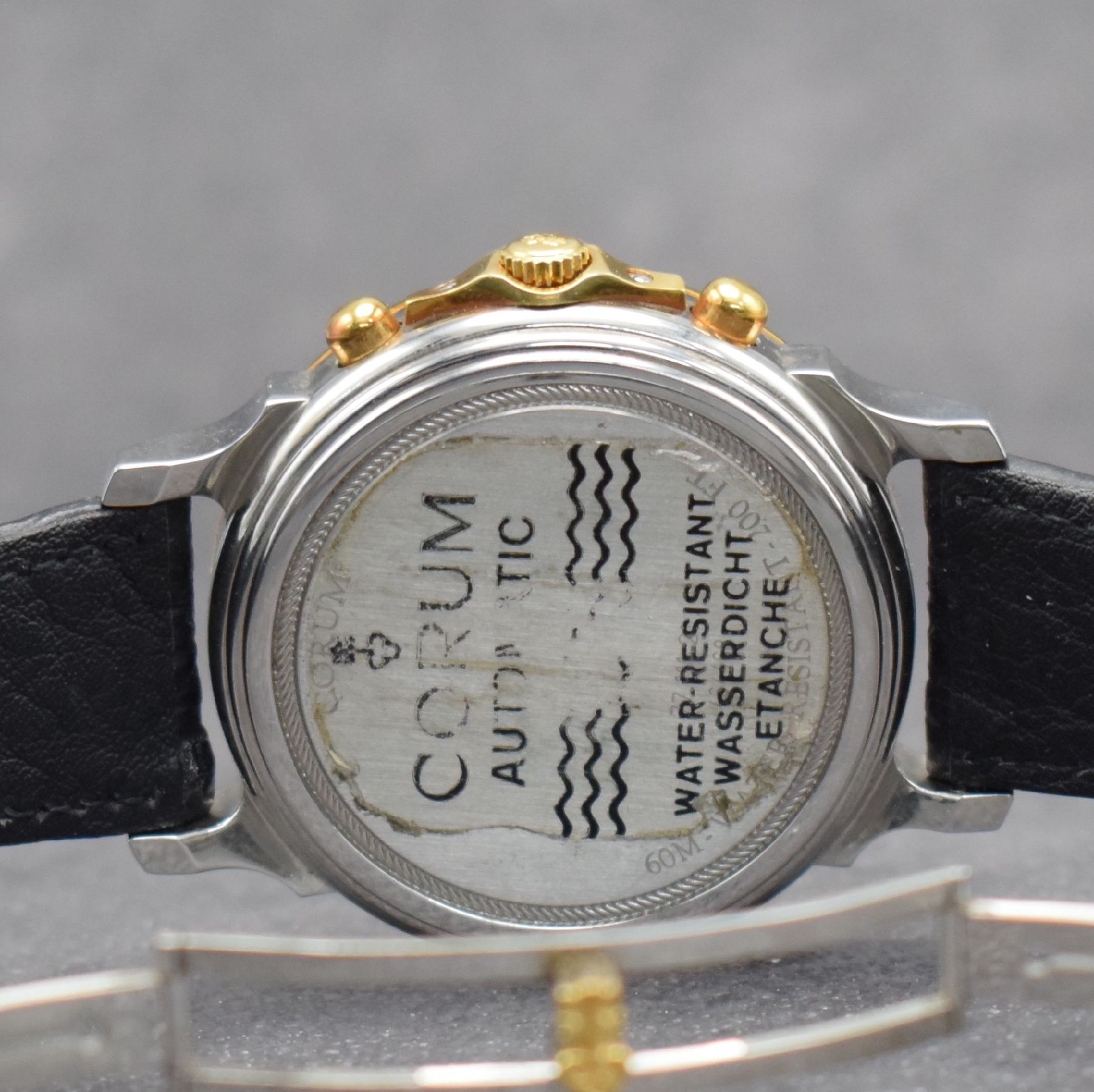 Detail f: CORUM Armbandchronograph Les Temps Mecanique Referenz 77.111.21, Automatik, Schweiz um 1990, Edelstahl/Gold kombiniert inkl. orig. Lederband (zu ...