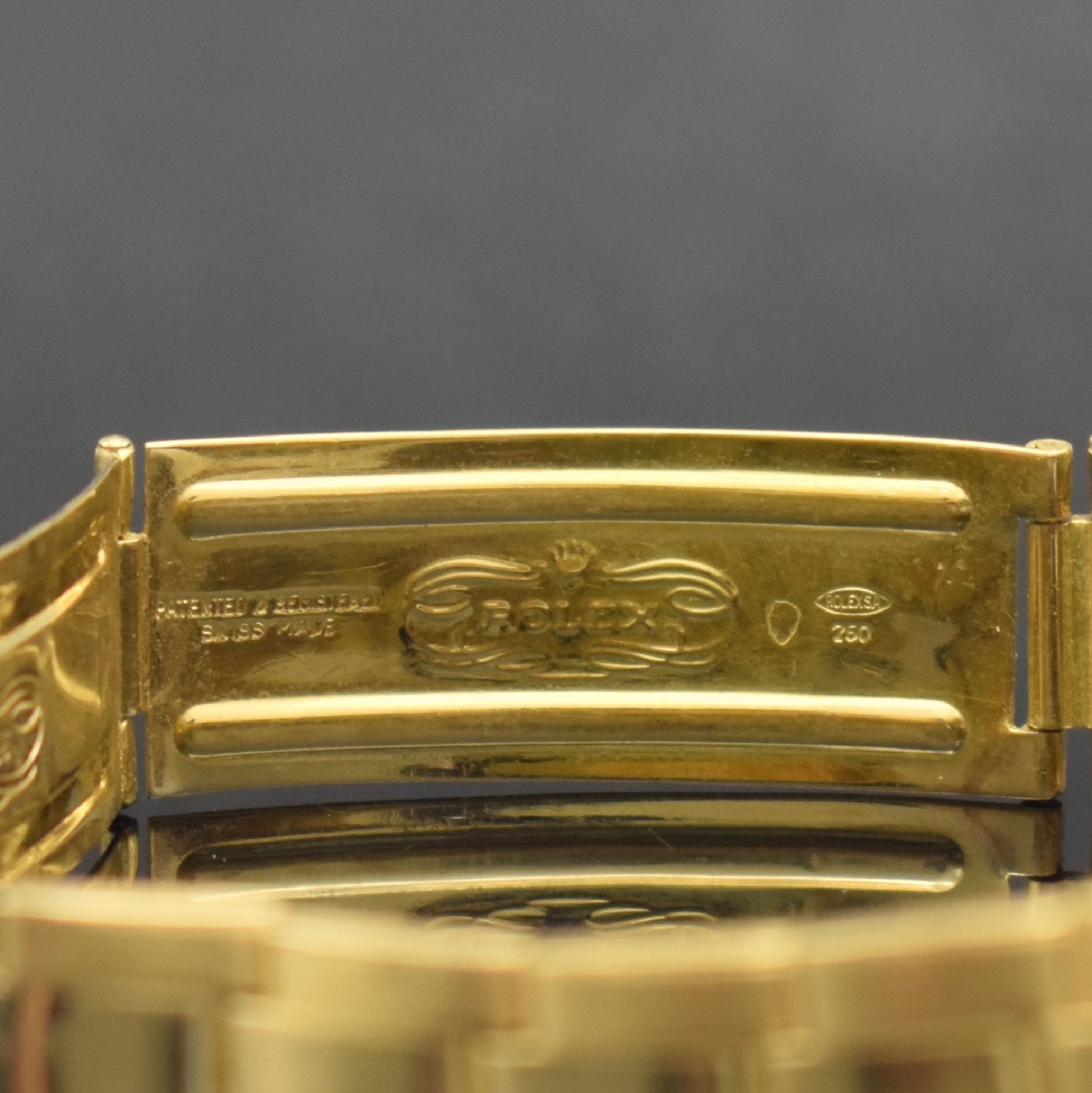Detail e: ROLEX sehr seltene Herrenarmbanduhr Oyster Perpetual GMT-Master Referenz 1675, Schweiz um 1977, Automatik, Chronometer der Superlative, Oysterband ...