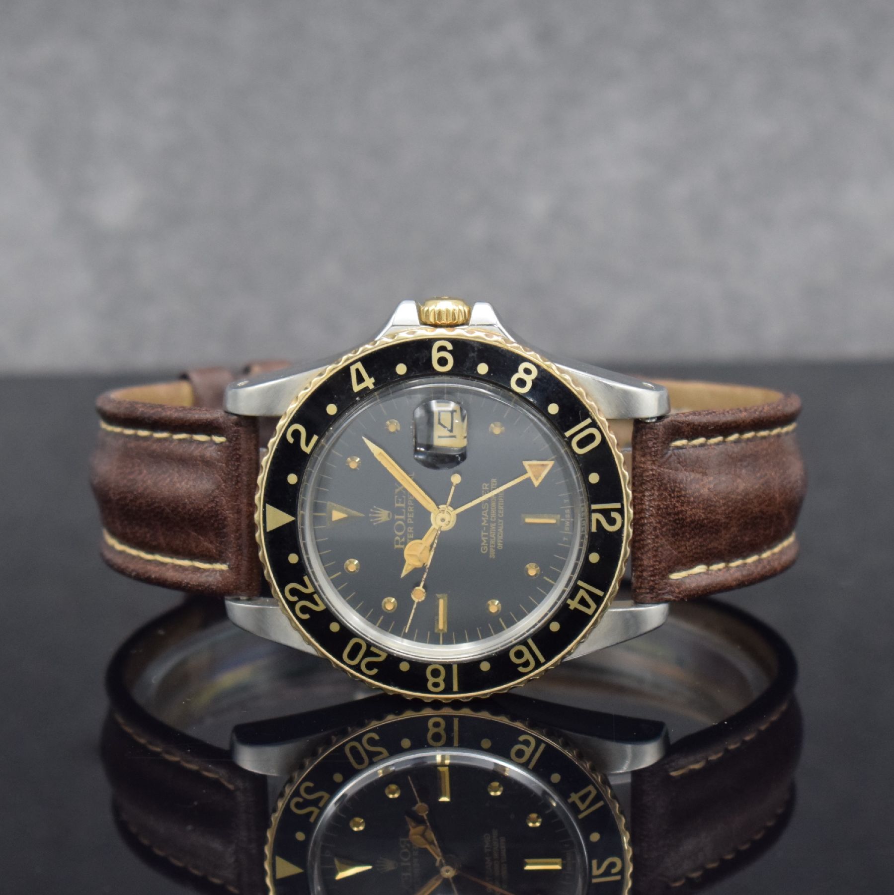 ROLEX Herrenarmbanduhr Oyster Perpetual GMT- Master Referenz 16753, Automatik, Schweiz um 1982, Chronometer der Superlative in Edelstahl/Gold ...