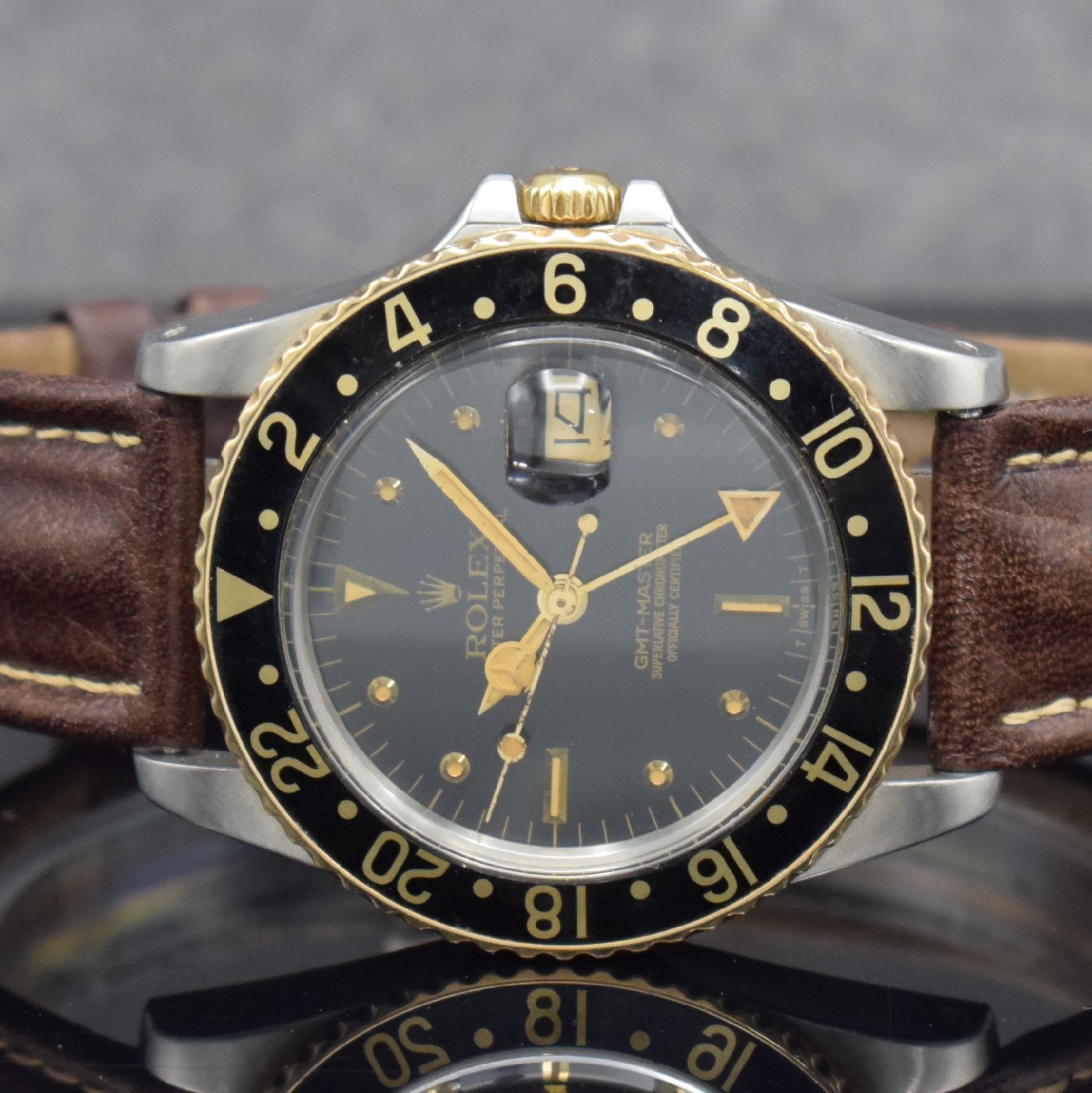 Detail a: ROLEX Herrenarmbanduhr Oyster Perpetual GMT- Master Referenz 16753, Automatik, Schweiz um 1982, Chronometer der Superlative in Edelstahl/Gold ...