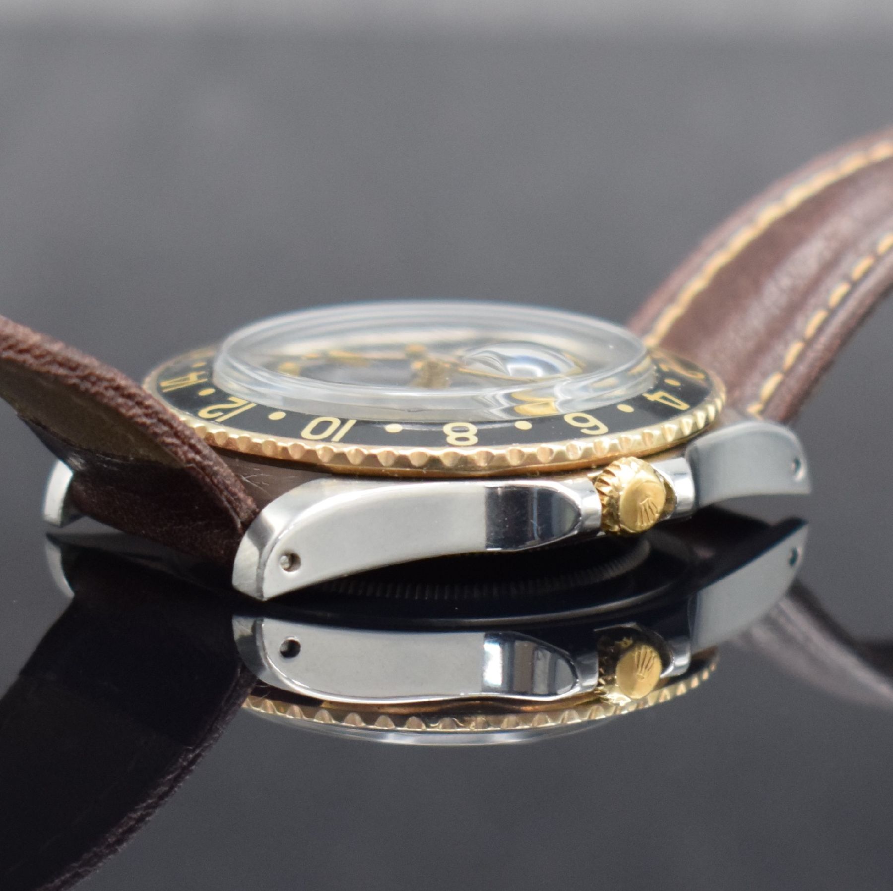 Detail d: ROLEX Herrenarmbanduhr Oyster Perpetual GMT- Master Referenz 16753, Automatik, Schweiz um 1982, Chronometer der Superlative in Edelstahl/Gold ...
