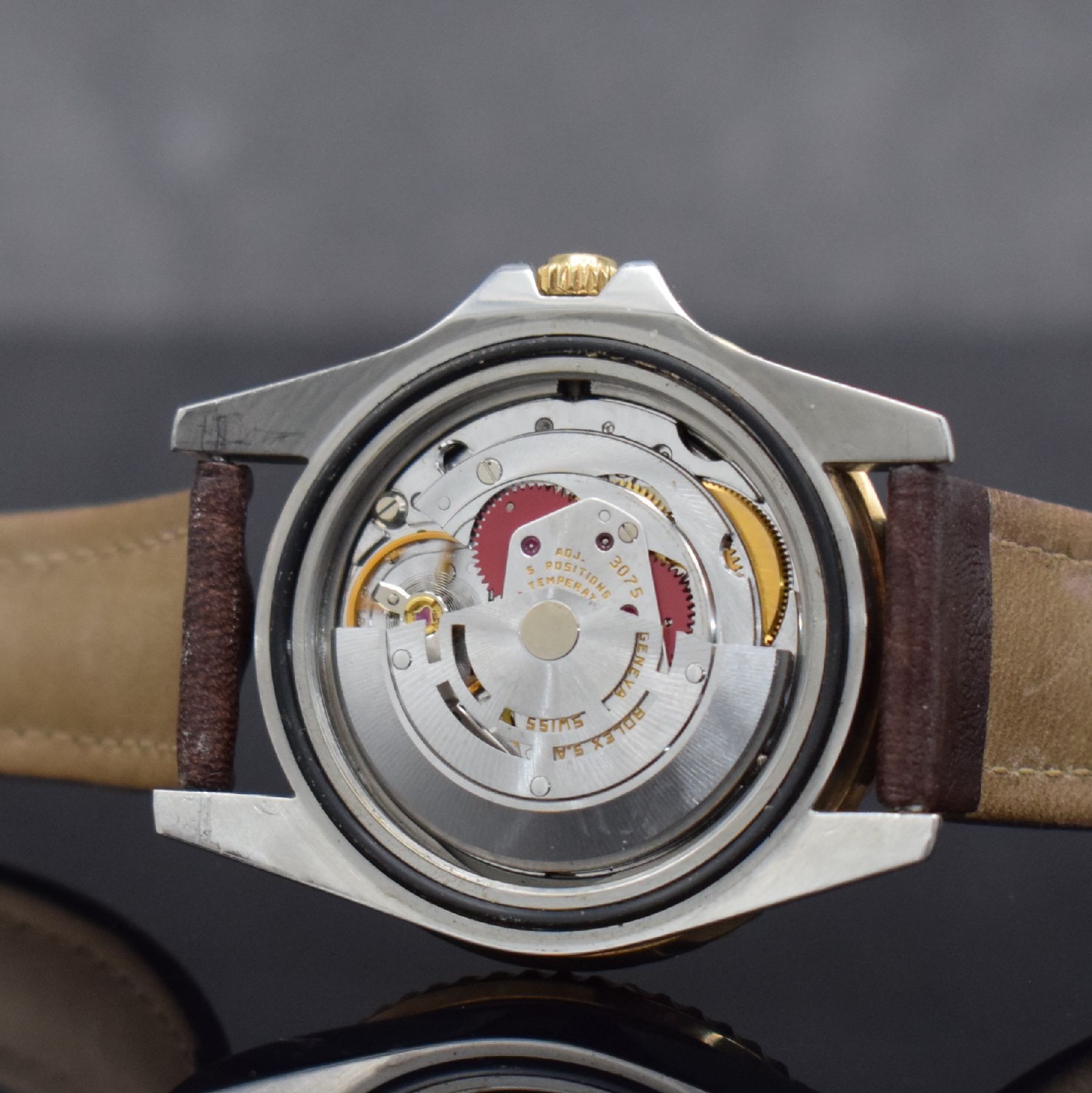 Detail e: ROLEX Herrenarmbanduhr Oyster Perpetual GMT- Master Referenz 16753, Automatik, Schweiz um 1982, Chronometer der Superlative in Edelstahl/Gold ...