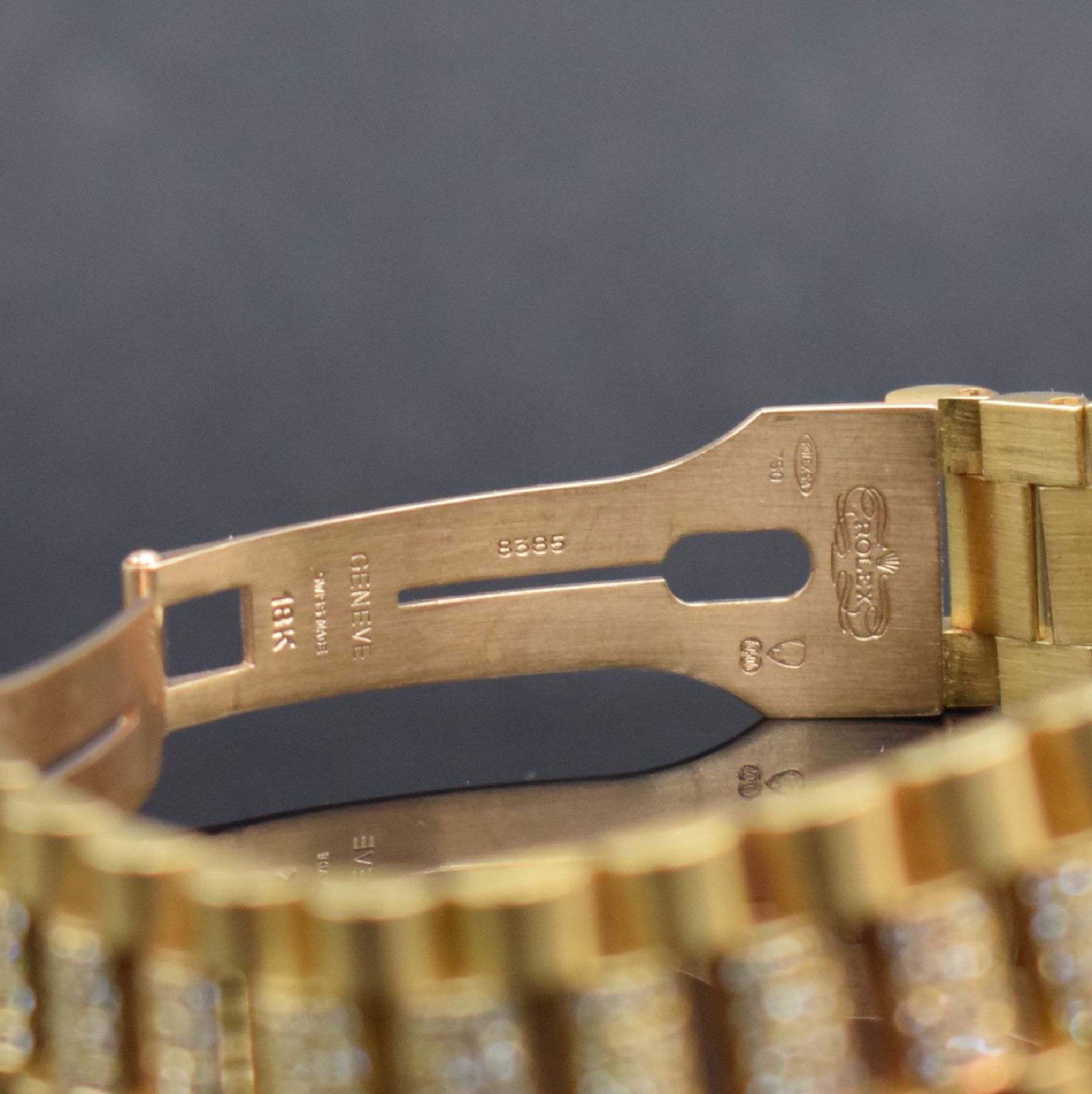 Detail e: ROLEX Herrenarmbanduhr Oyster Perpetual Day- Date in GG 750/000 Referenz 18038, Automatik, Schweiz um 1980, Presidentband mit Faltschl., Lünette & ...