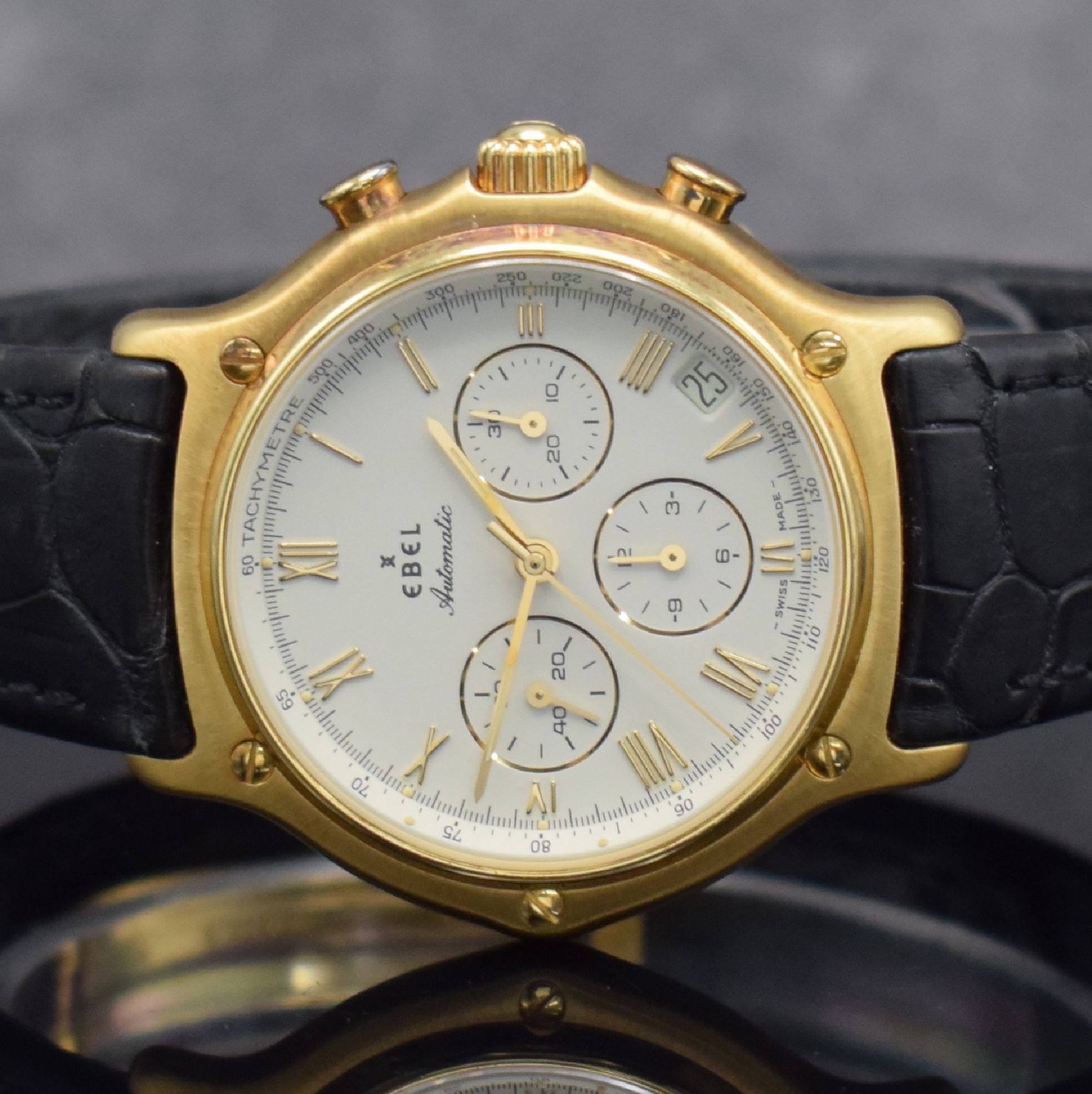 Detail a: EBEL El Primero Schaltradchronograph in GG 750/000, Automatik, Schweiz um 1995, Ref. 8134901, orig. Lederband m. orig. GG 750/000 Faltschl., Boden ...