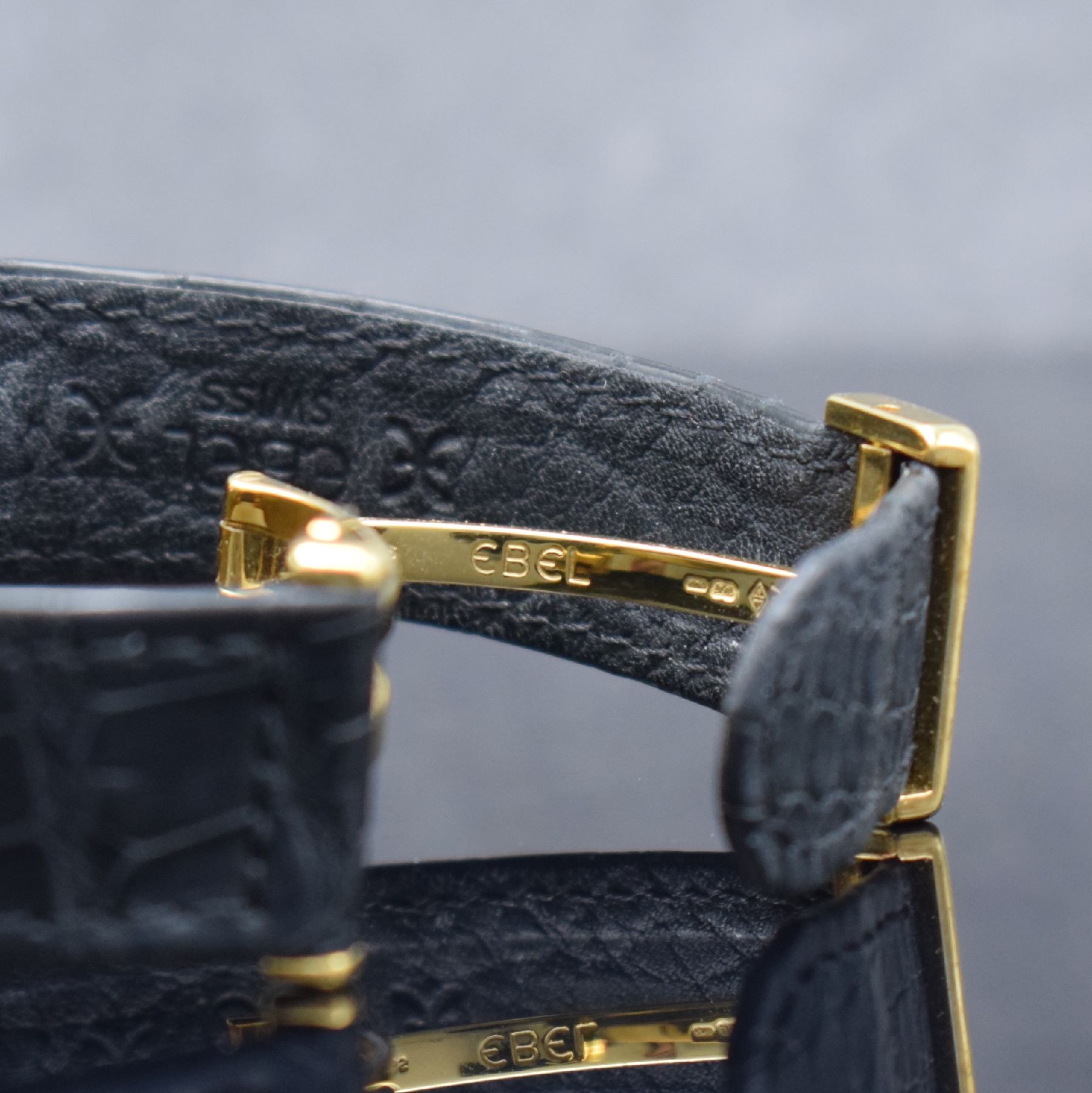 Detail d: EBEL El Primero Schaltradchronograph in GG 750/000, Automatik, Schweiz um 1995, Ref. 8134901, orig. Lederband m. orig. GG 750/000 Faltschl., Boden ...