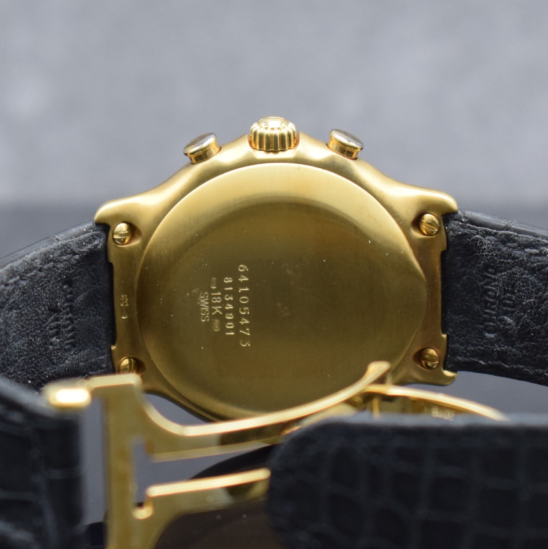 Detail e: EBEL El Primero Schaltradchronograph in GG 750/000, Automatik, Schweiz um 1995, Ref. 8134901, orig. Lederband m. orig. GG 750/000 Faltschl., Boden ...