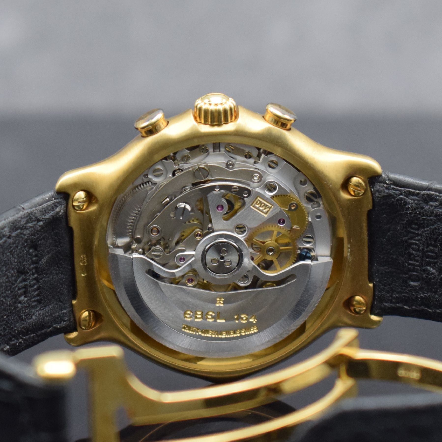 Detail f: EBEL El Primero Schaltradchronograph in GG 750/000, Automatik, Schweiz um 1995, Ref. 8134901, orig. Lederband m. orig. GG 750/000 Faltschl., Boden ...