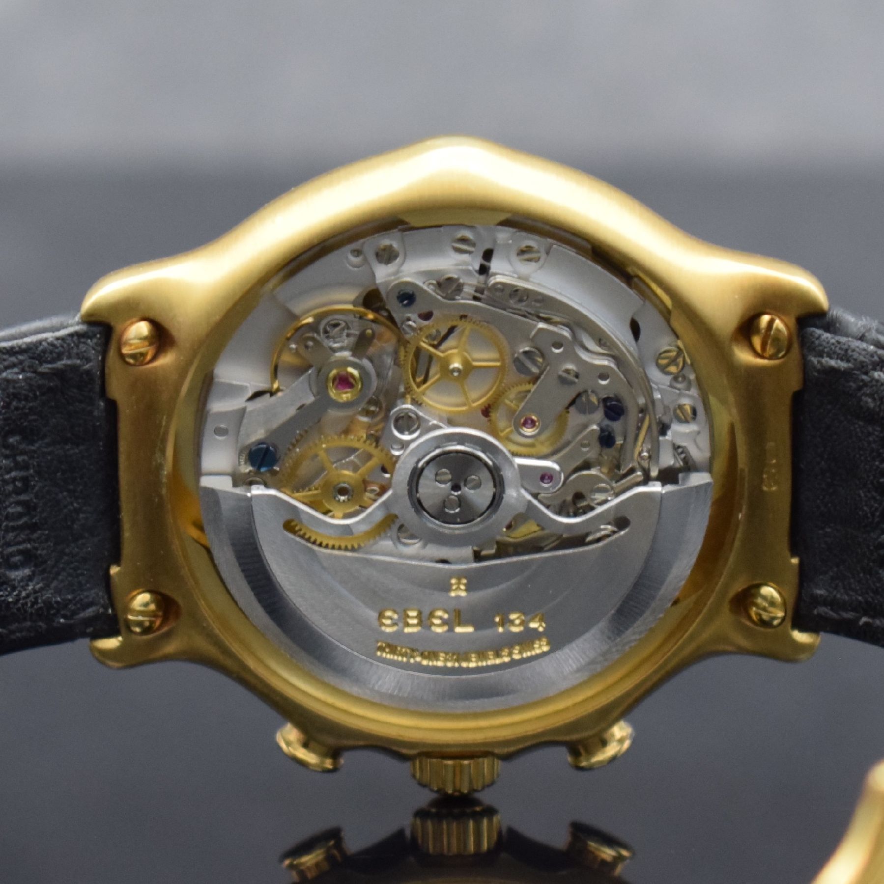 Detail g: EBEL El Primero Schaltradchronograph in GG 750/000, Automatik, Schweiz um 1995, Ref. 8134901, orig. Lederband m. orig. GG 750/000 Faltschl., Boden ...