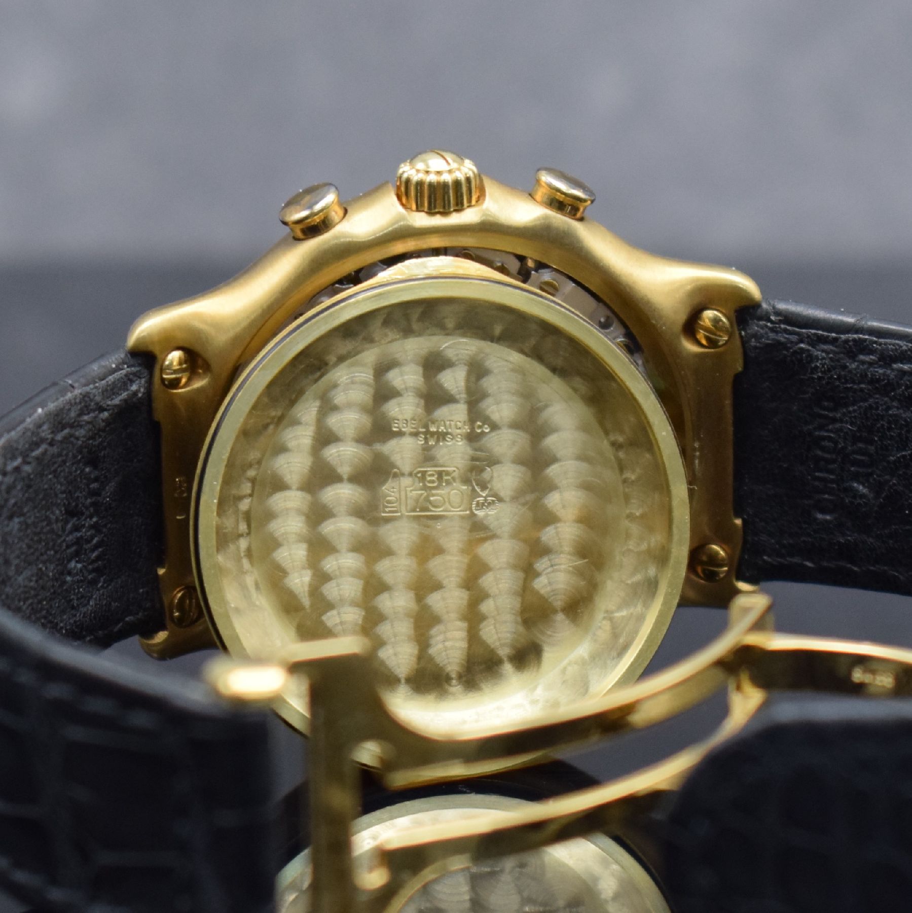 Detail h: EBEL El Primero Schaltradchronograph in GG 750/000, Automatik, Schweiz um 1995, Ref. 8134901, orig. Lederband m. orig. GG 750/000 Faltschl., Boden ...