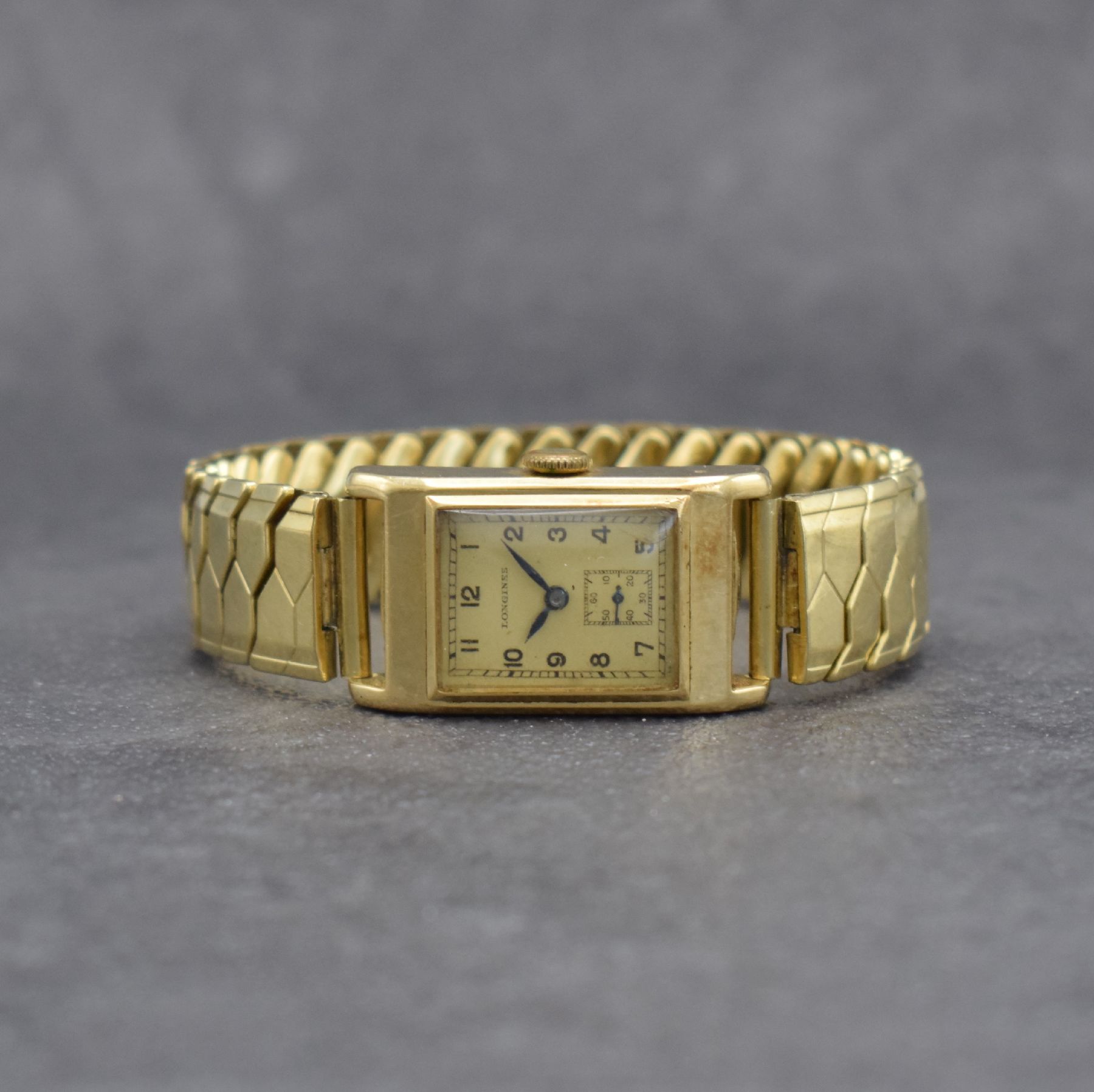 LONGINES Armbanduhr in GG 585/000 mit Elasto-Fixo Band mit Kappe in GG 585/000, Schweiz um 1937, Handaufzug, 2-teil. Gehäuse, Boden aufgedr., ...