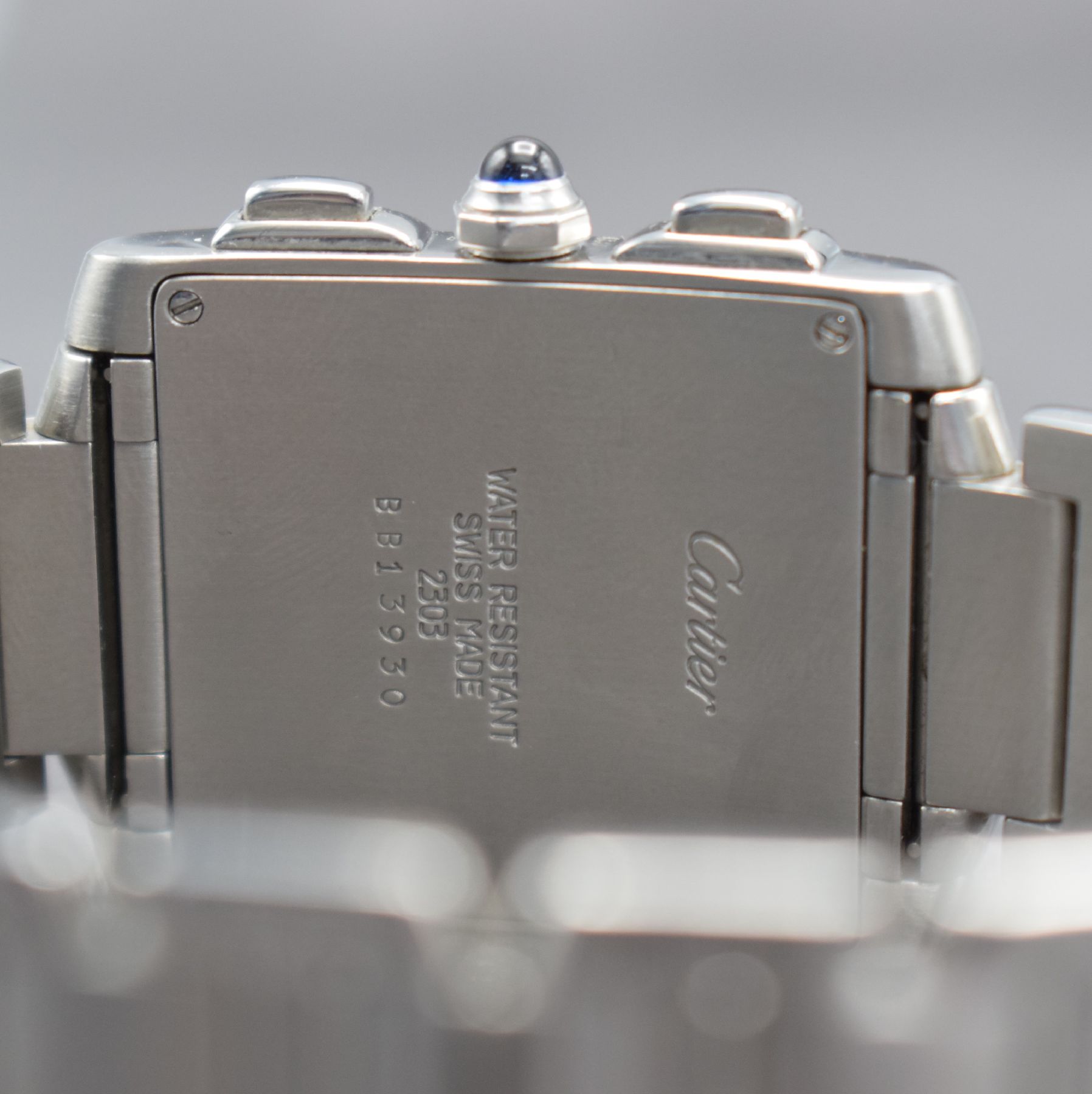 Detail e: CARTIER Armbandchronograph Tank Francaise, Schweiz um 1997, Ref. 2303, Edelstahlgeh. inkl. Gliederband m. dopp. Faltschl., Boden 4 -fach verschr., ...