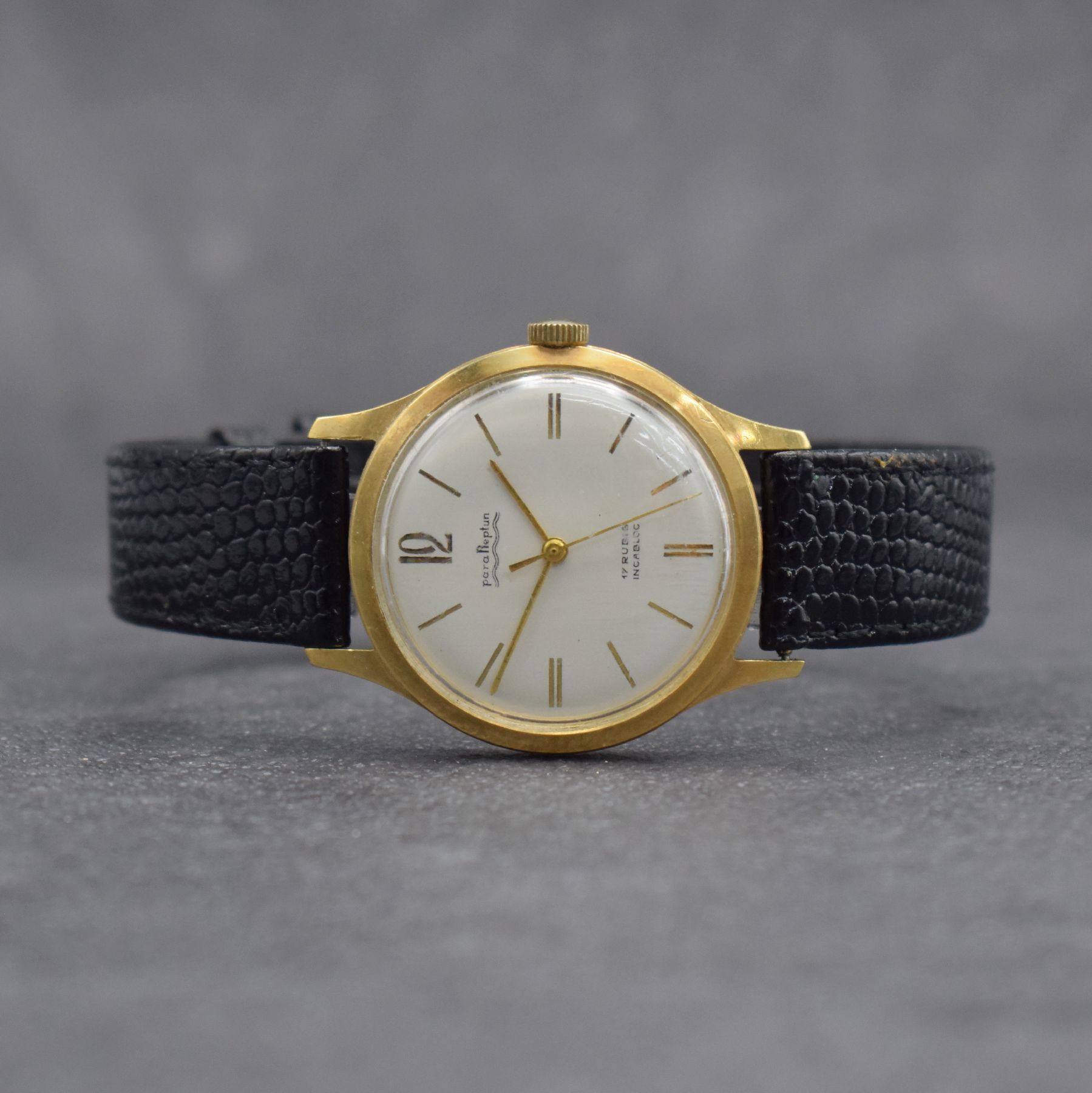 PARA NEPTUN Armbanduhr in GG 585/000, Schweiz um 1960, Handaufzug, Boden verschr., weißes Zifferbl. m. gold. Stundenindizes & Zeigern, rhod. Werk ...