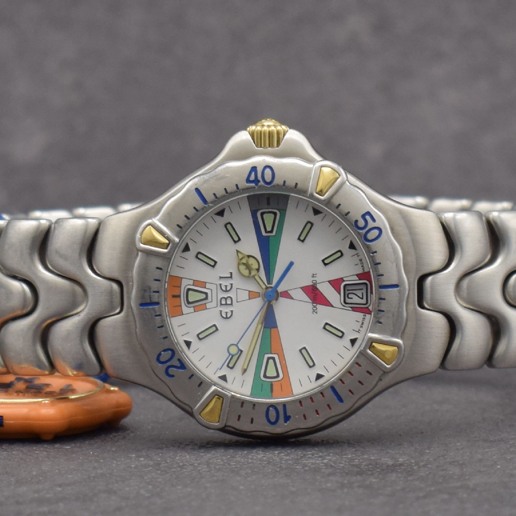 Detail a: EBEL Sportwave Armbanduhr, quarz, Ref. 6187531, verschr. Geh. in Stahl inkl. Gliederband. m. dopp. Faltschl., Reiter der Lünette & Krone in Gold, ...