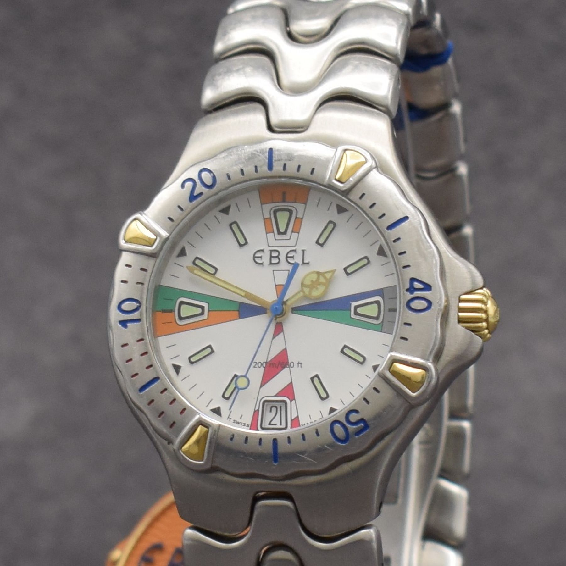 Detail c: EBEL Sportwave Armbanduhr, quarz, Ref. 6187531, verschr. Geh. in Stahl inkl. Gliederband. m. dopp. Faltschl., Reiter der Lünette & Krone in Gold, ...