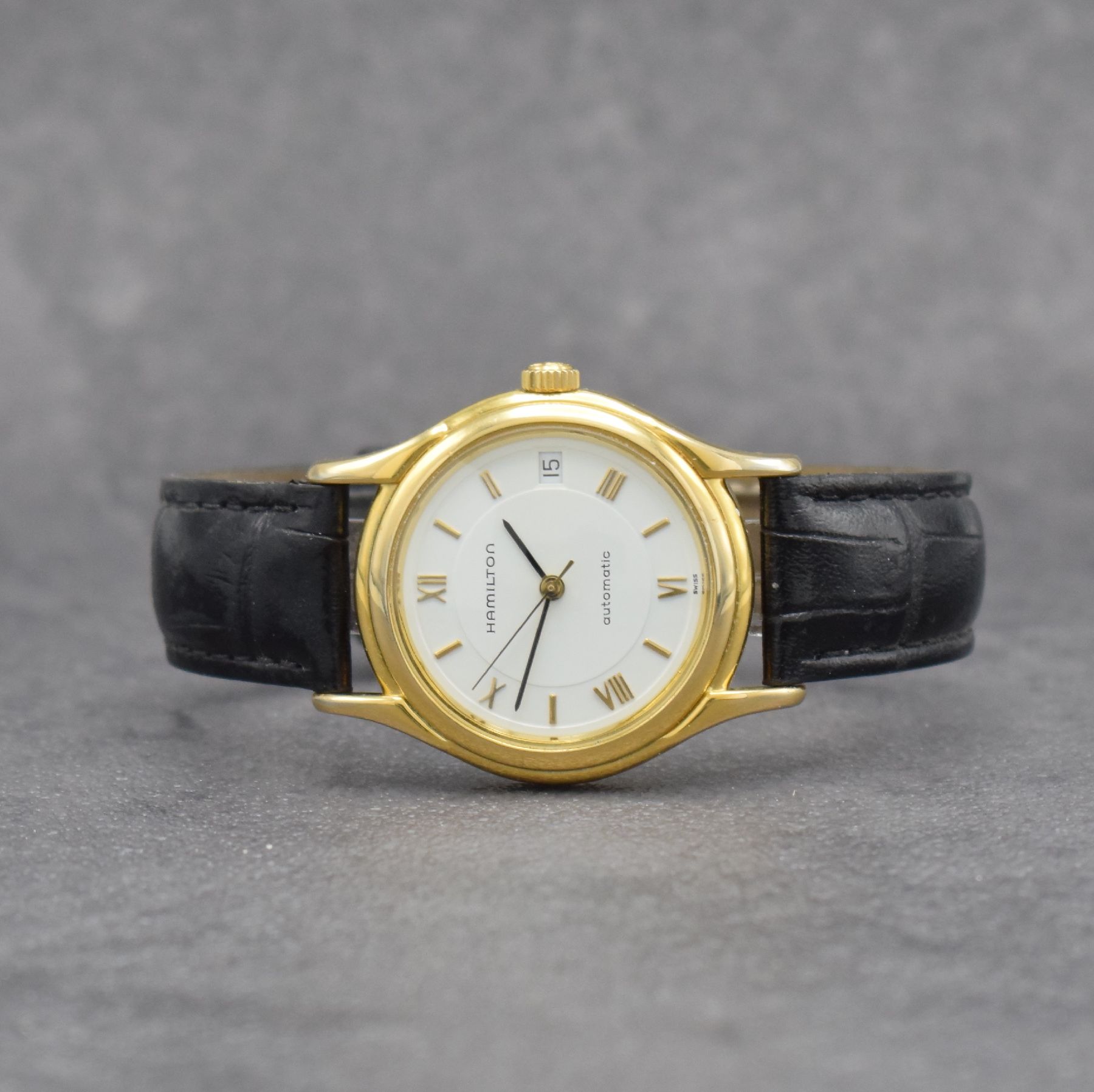 HAMILTON Herrenarmbanduhr, Automatik, Schweiz um 2010, verg. Metallgeh., Edelstahlboden verschr., beids. vergl., emailfarb. Zifferbl. m. aufgel. ...