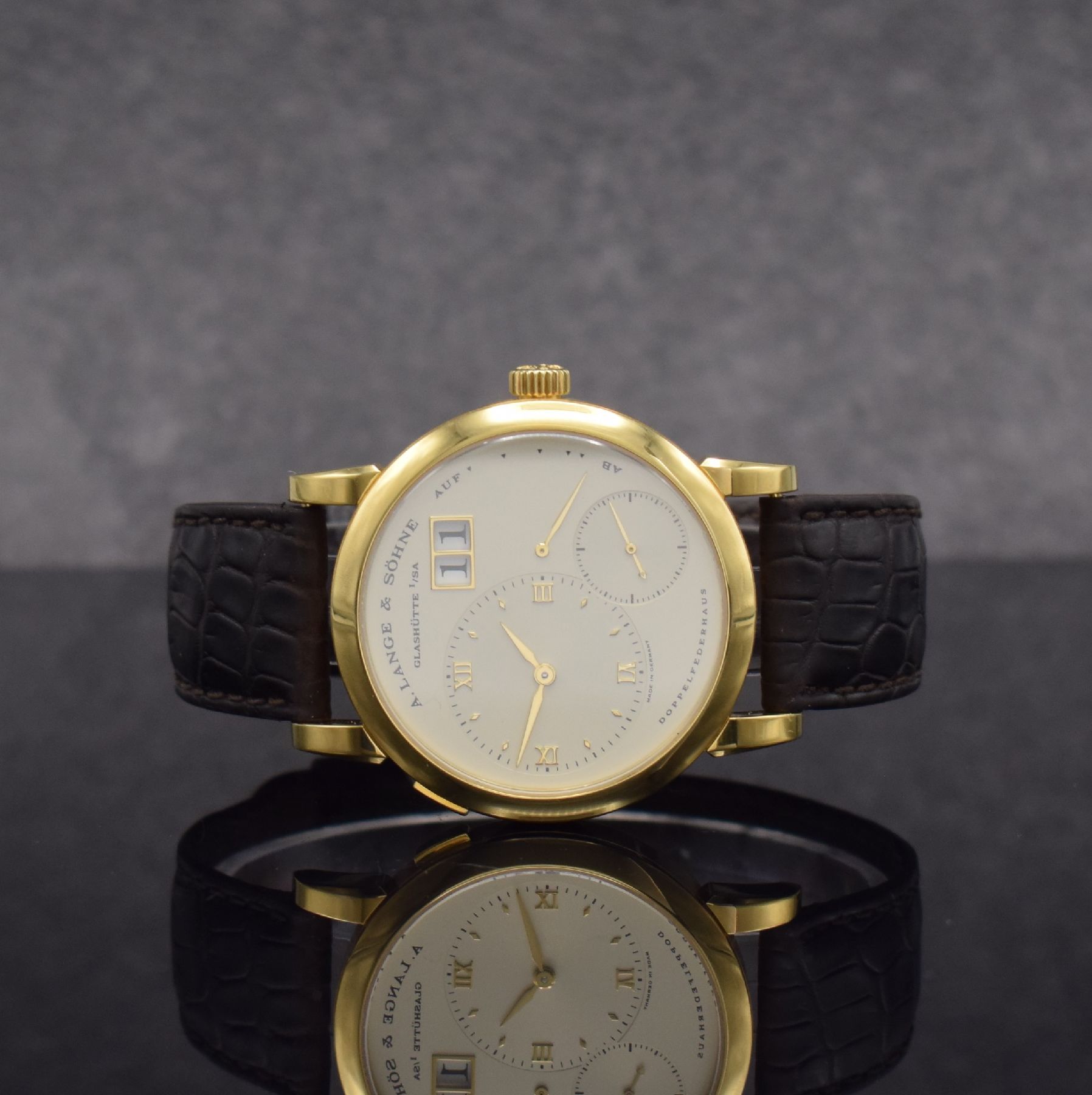 A. LANGE & SÖHNE "Lange 1" Referenz 101.021 feine Herrenarmbanduhr in GG 750/000, Deutschland um 1998, Handaufzug, massives beids. vergl. ...